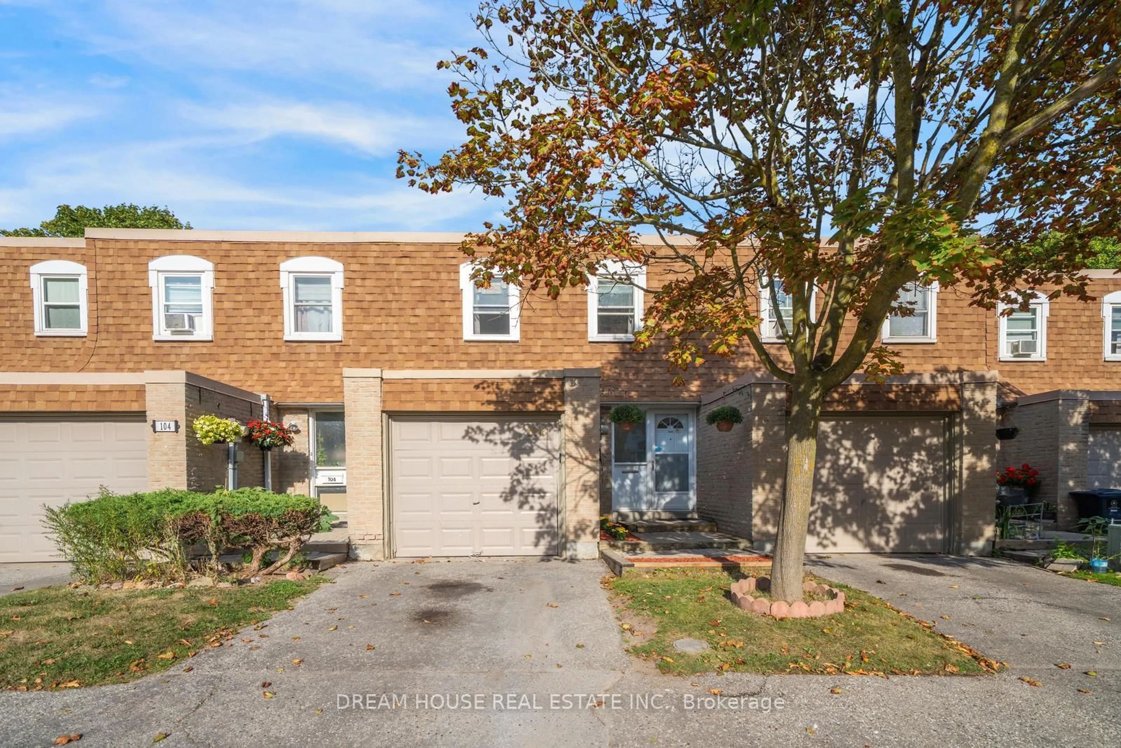 Home with brick exterior material, street for 850 Huntingwood Dr #106, Toronto Ontario M1T 2L9