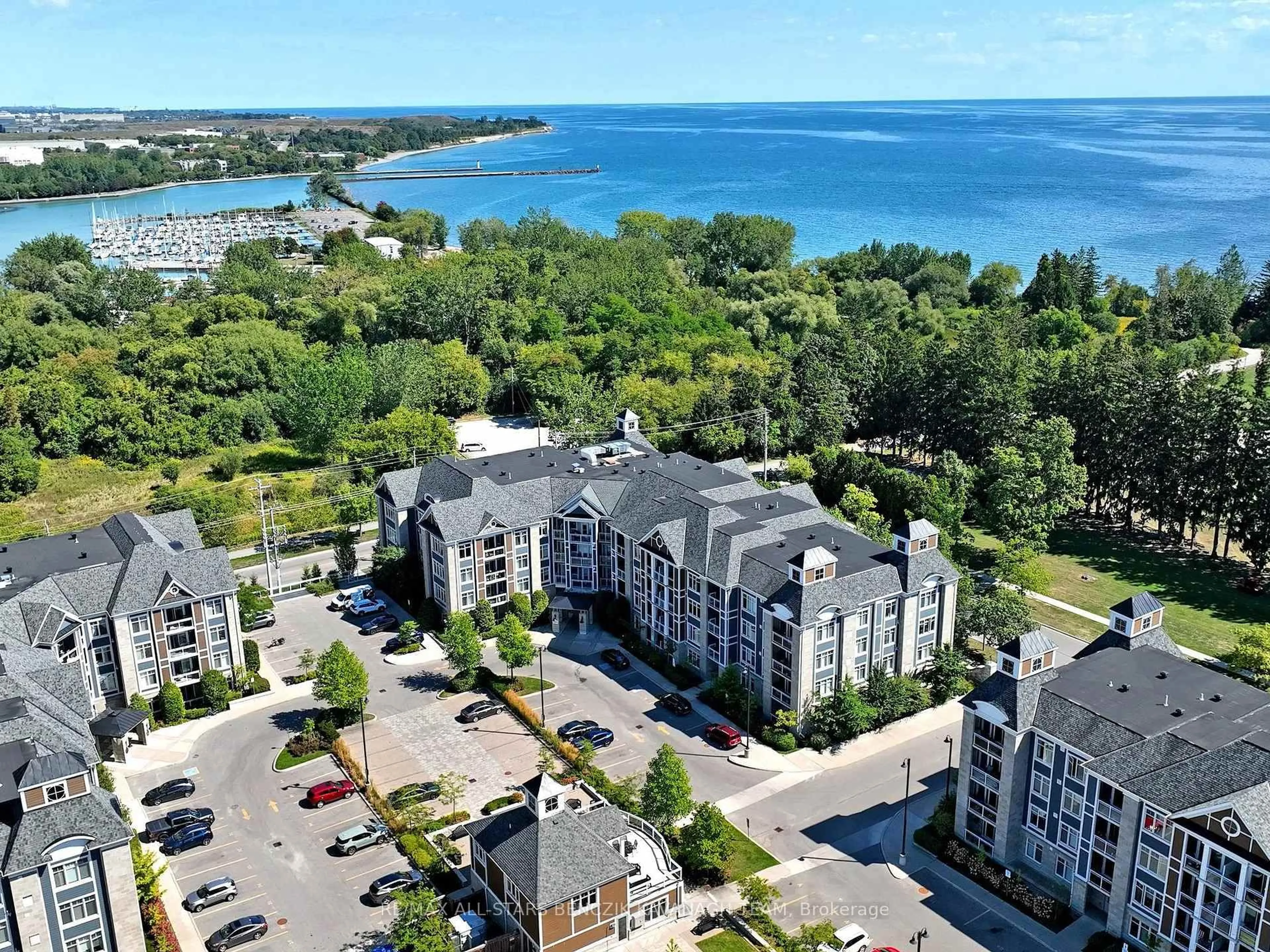 A pic from outside/outdoor area/front of a property/back of a property/a pic from drone, water/lake/river/ocean view for 680 Gordon St #206, Whitby Ontario L1N 0L2