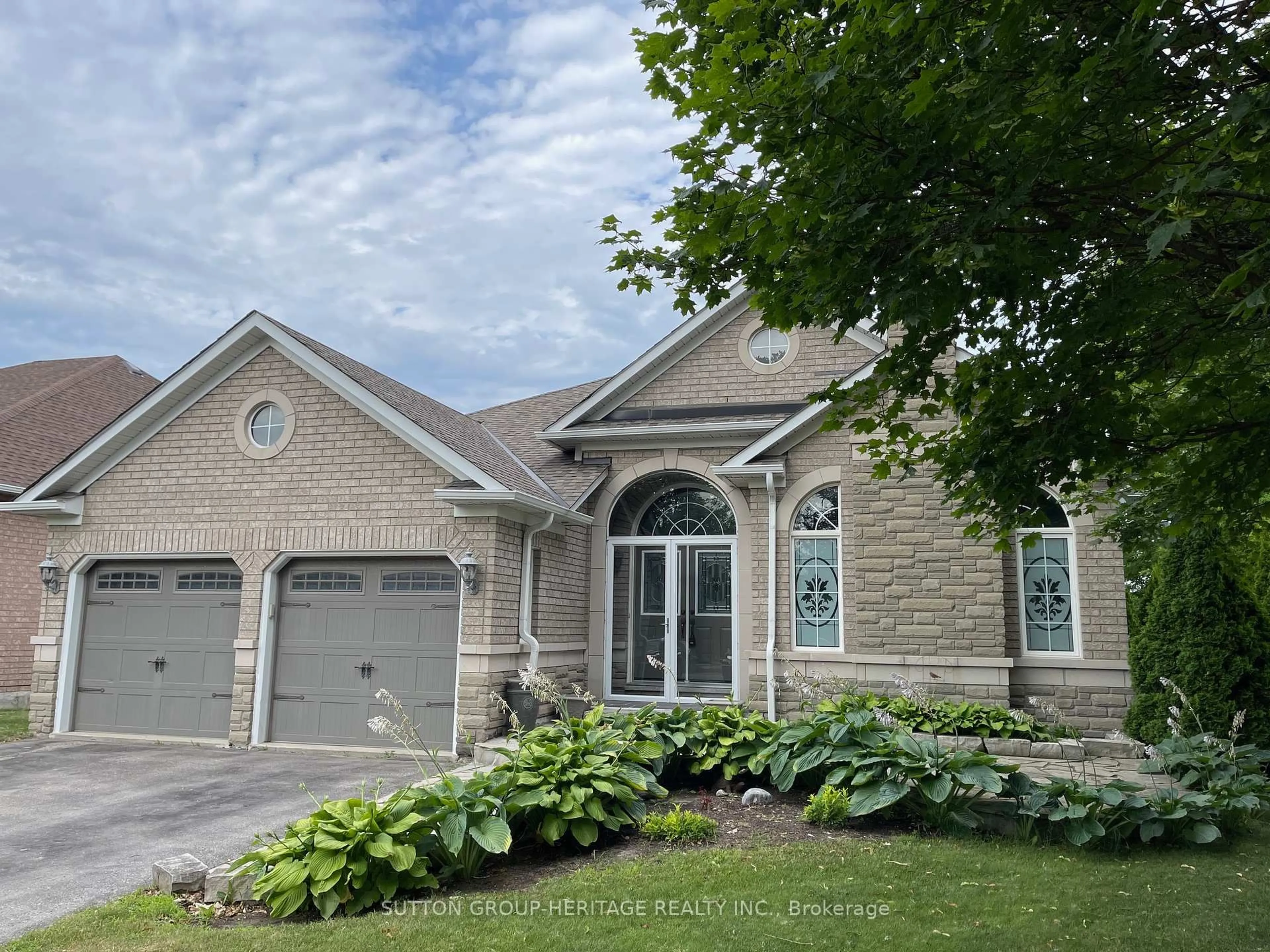 Home with brick exterior material, street for 57 Kimberly Dr, Whitby Ontario L1M 1K5