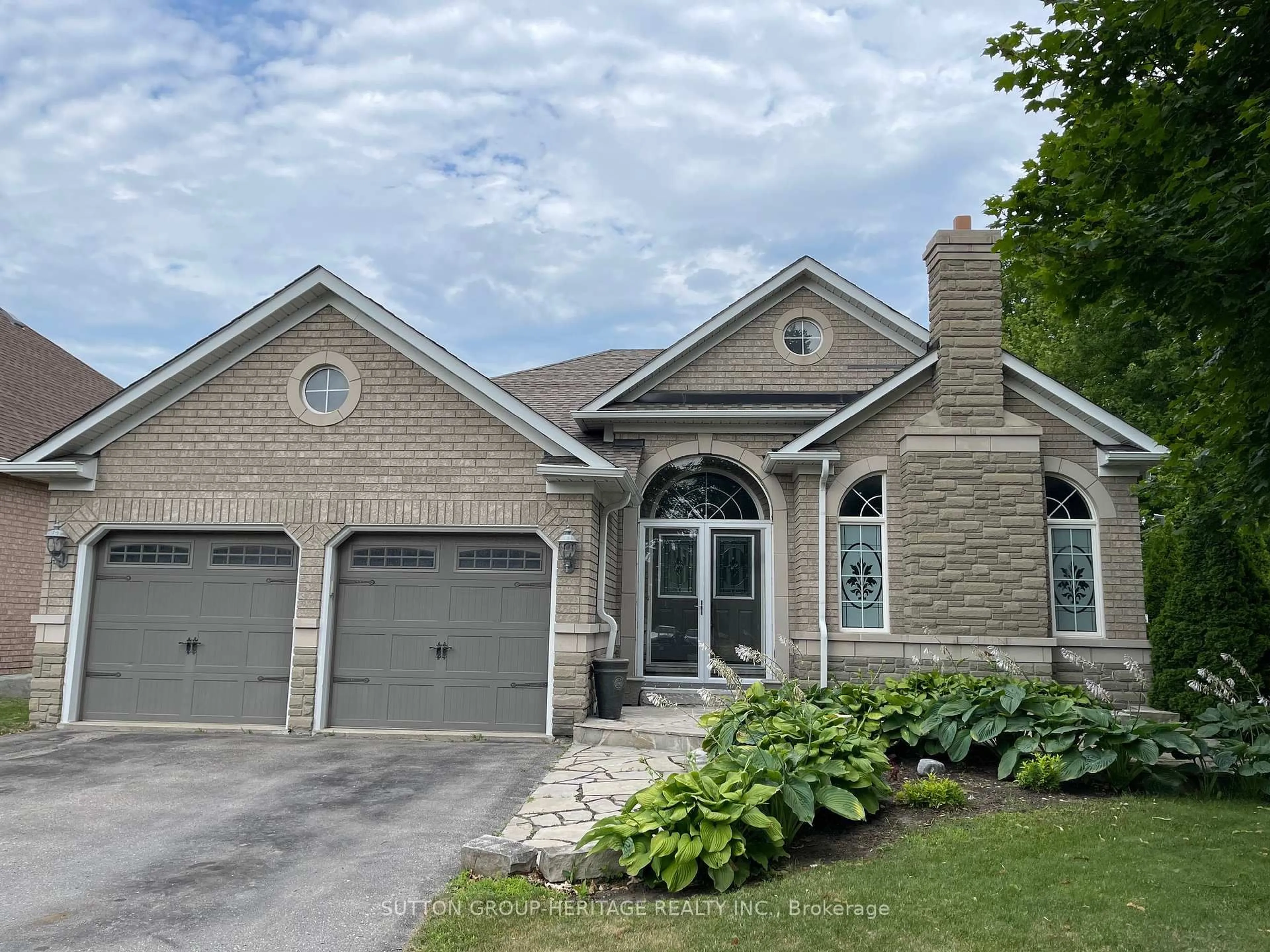 Home with brick exterior material, street for 57 Kimberly Dr, Whitby Ontario L1M 1K5