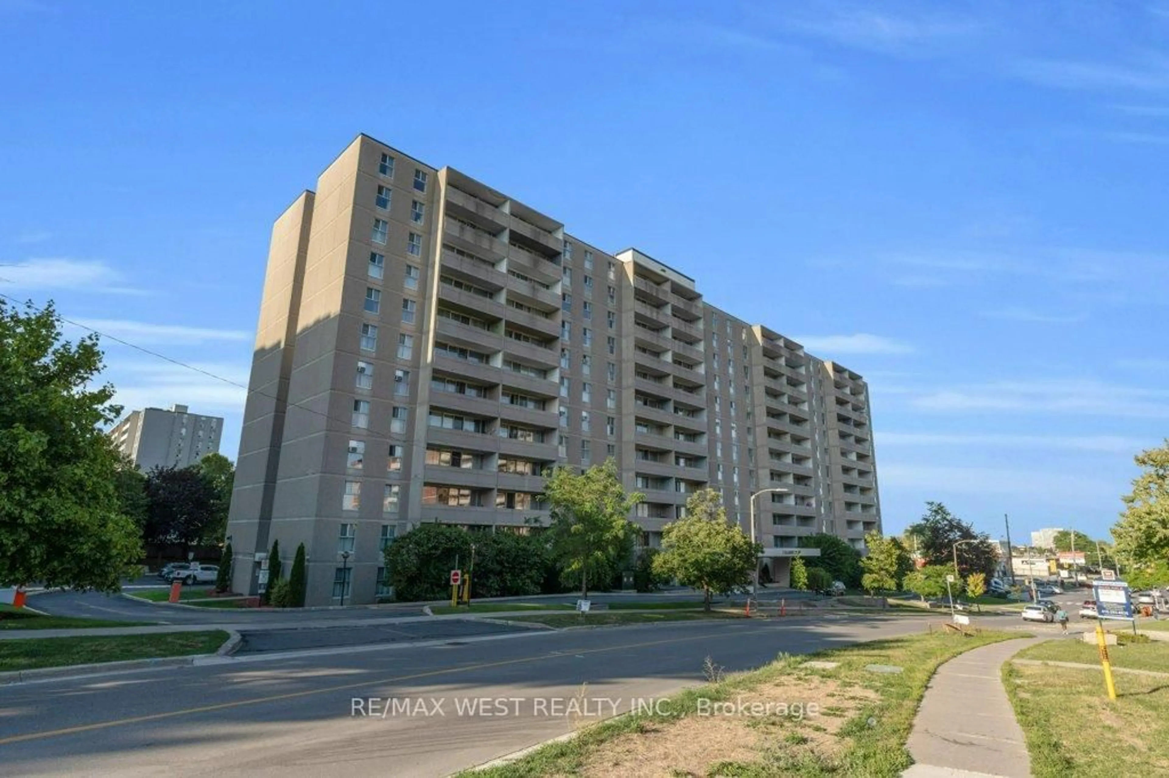 A pic from outside/outdoor area/front of a property/back of a property/a pic from drone, street for 2 Glamorgan Ave #203, Toronto Ontario M1P 2M8