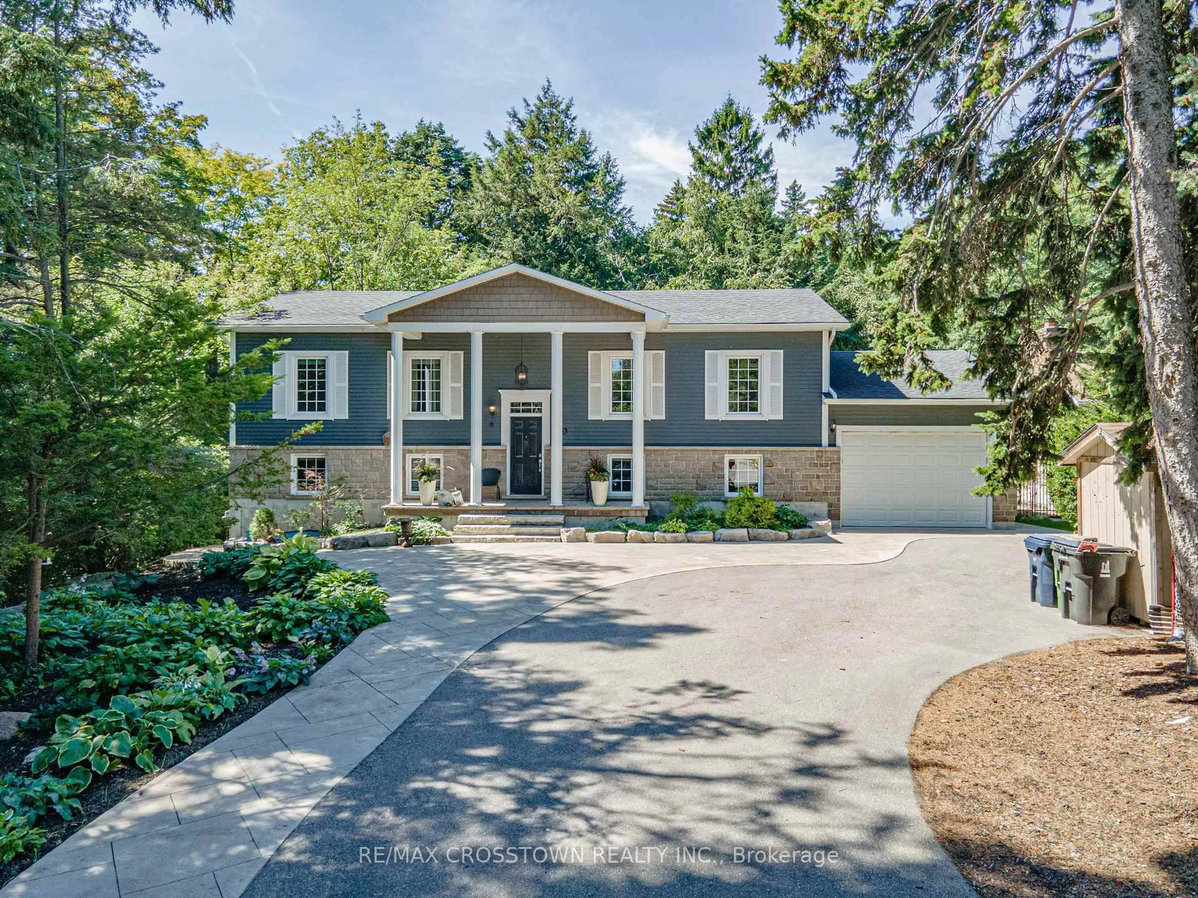 Home with vinyl exterior material, street for 50 Chine Dr, Toronto Ontario M1M 2K7