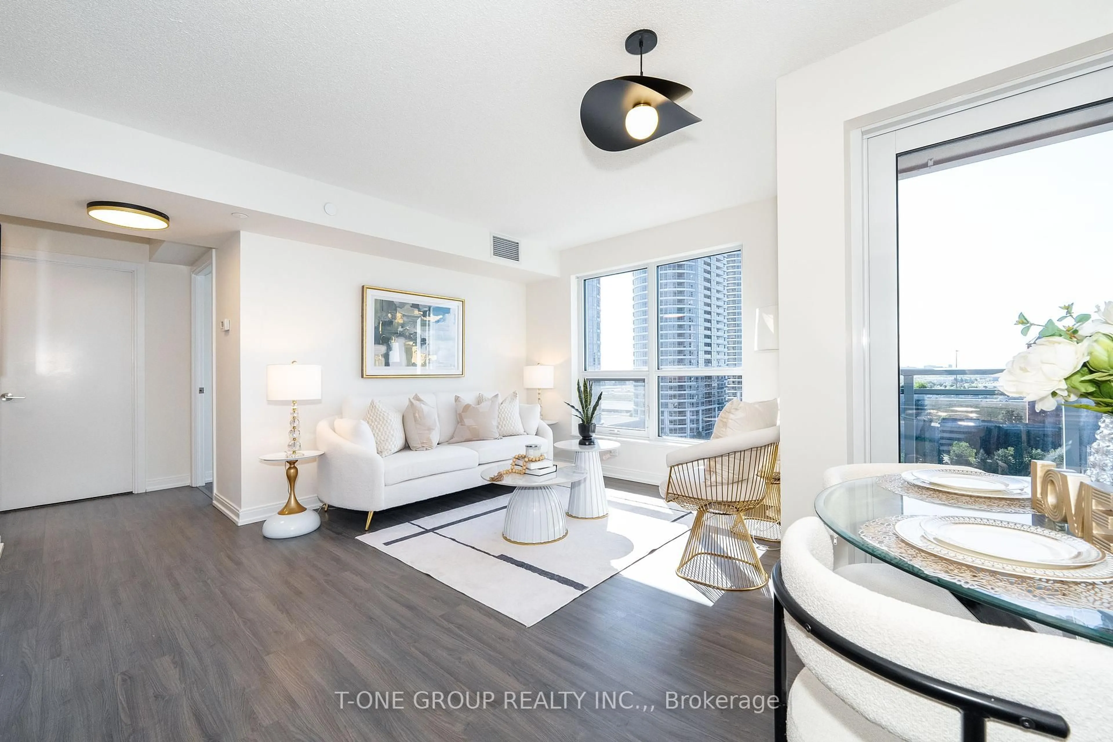 Living room with furniture, unknown for 255 Village Green Sq #1003, Toronto Ontario M1S 0L7