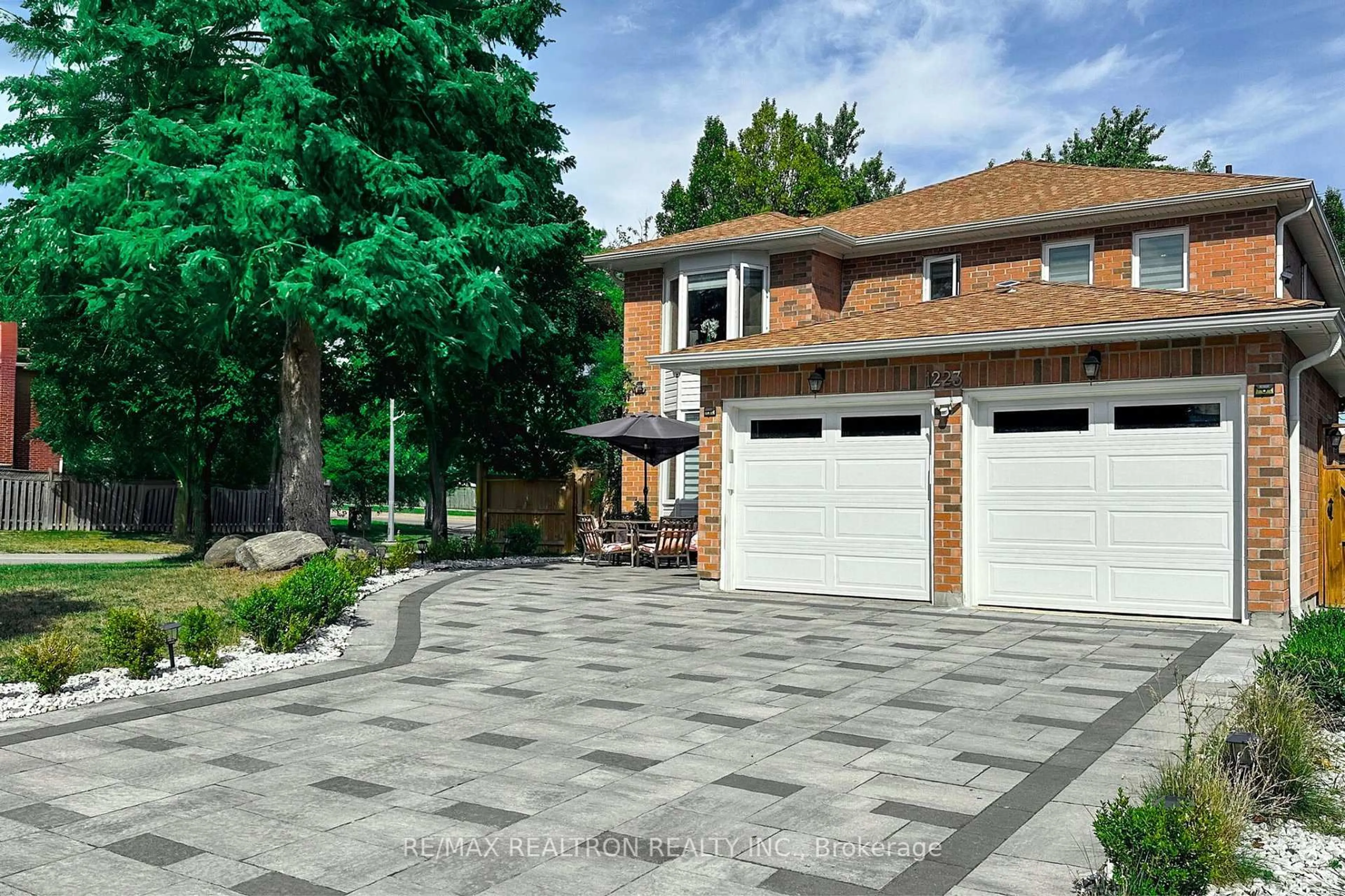 Home with brick exterior material, street for 1223 Fawndale Rd, Pickering Ontario L1V 4M4