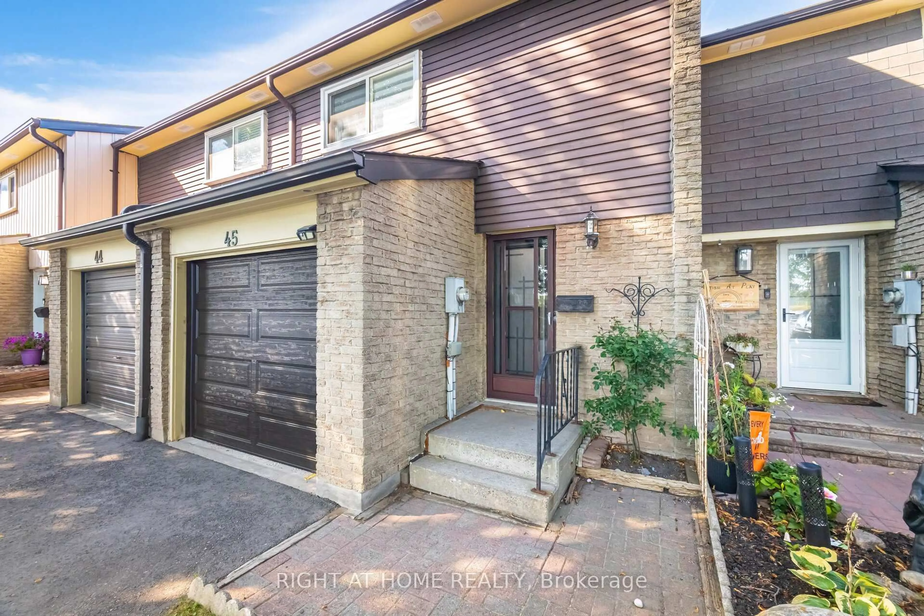 Home with brick exterior material, street for 907 Burns St #45, Whitby Ontario L1N 6J5
