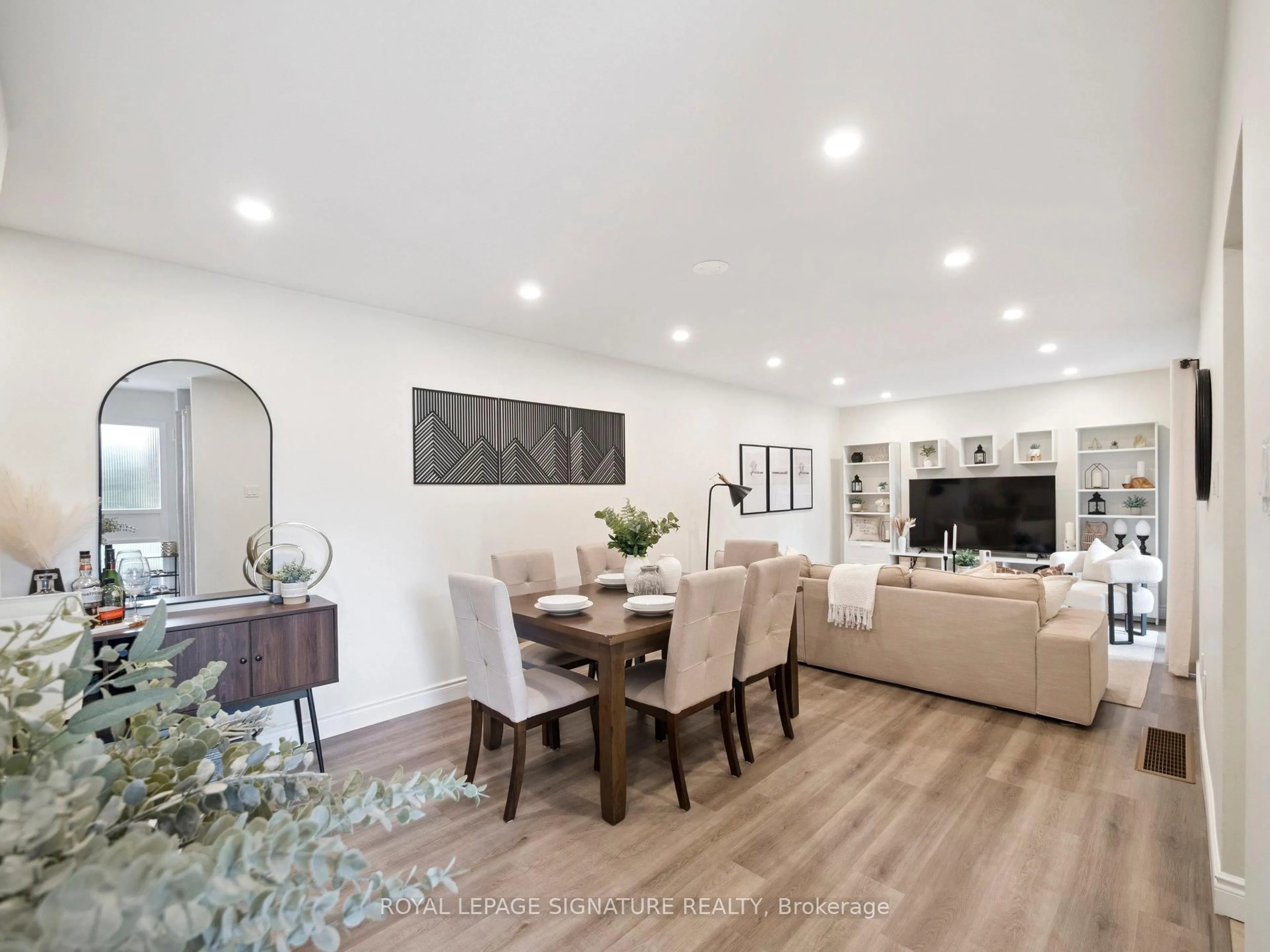 Living room with furniture, wood/laminate floor for 103 Dovedale Dr #41, Whitby Ontario L1N 1Z7