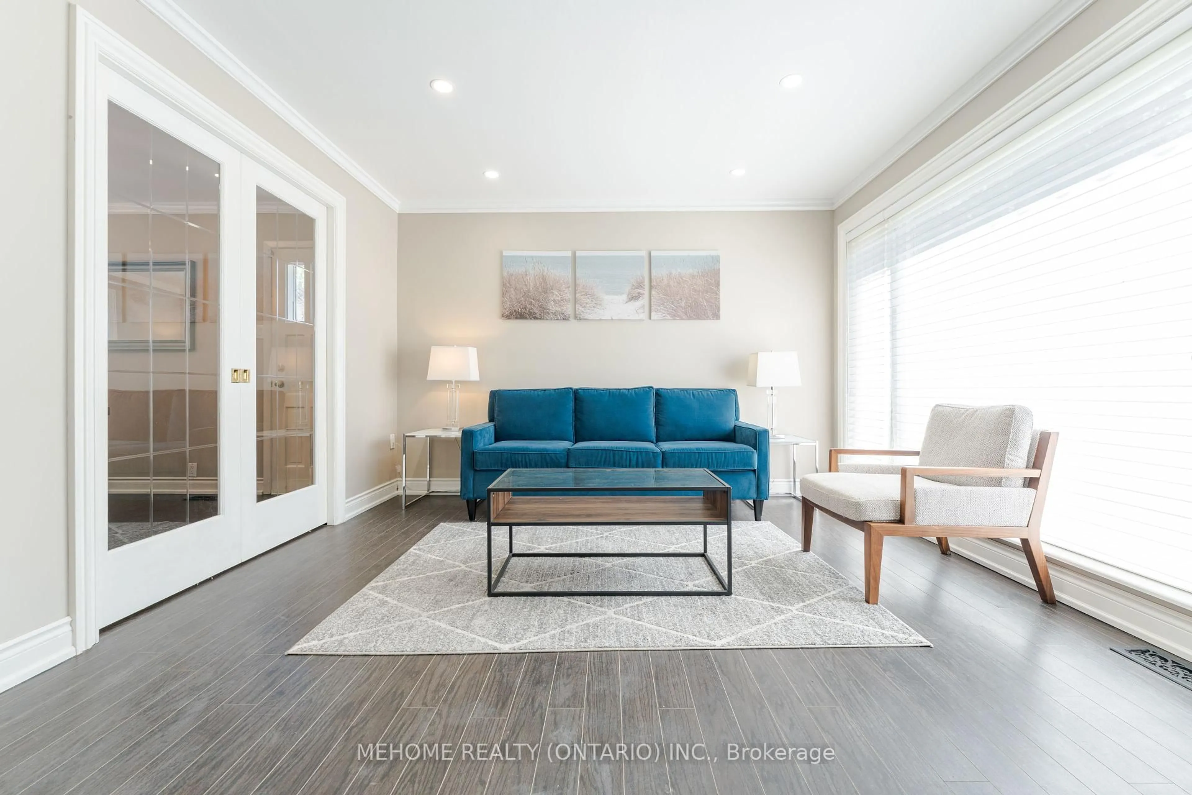 Living room with furniture, wood/laminate floor for 16 Abbottswood Rd, Toronto Ontario M1P 3P1