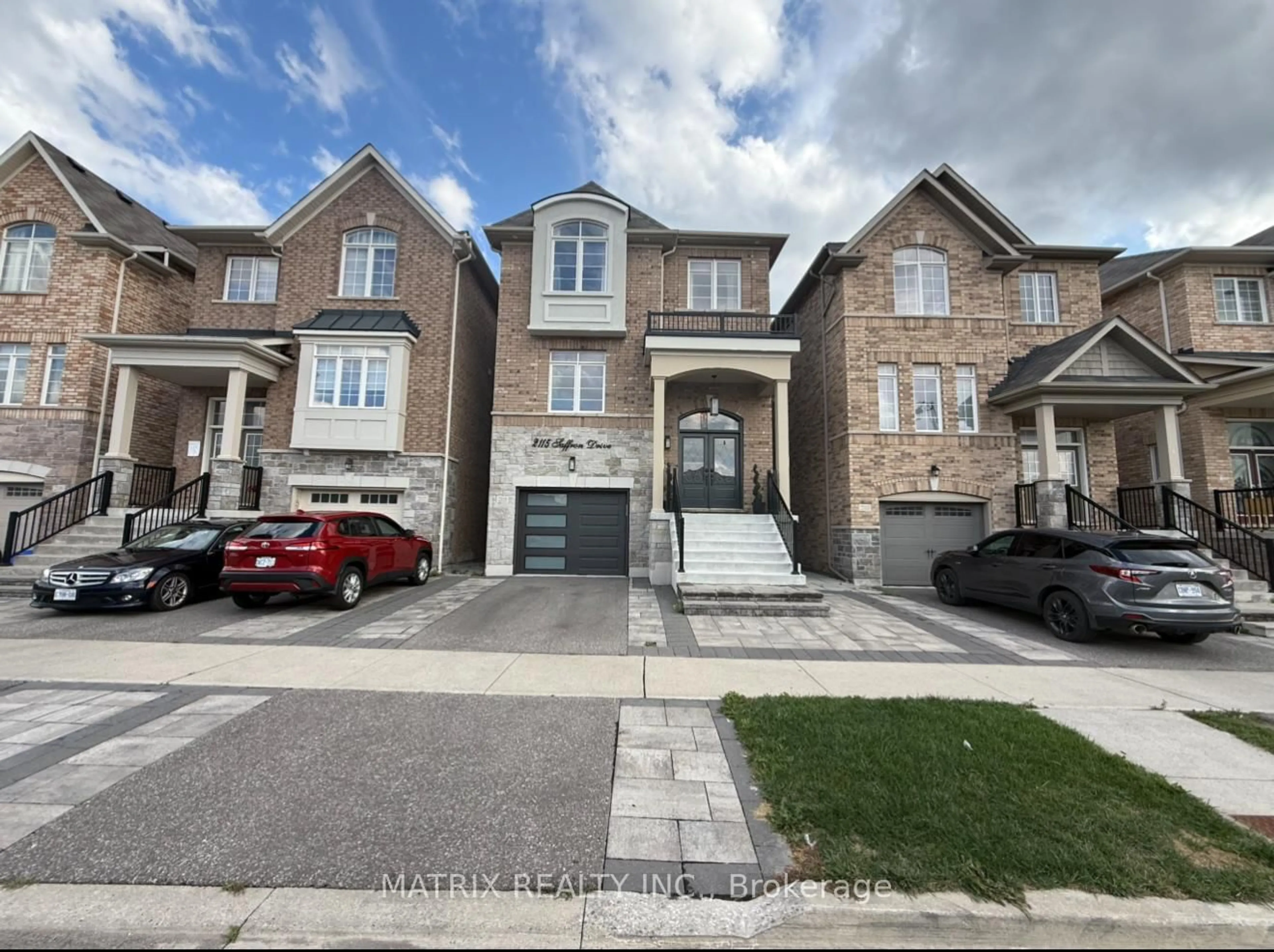 Home with brick exterior material, street for 2115 Saffron Dr, Pickering Ontario L1X 0E2