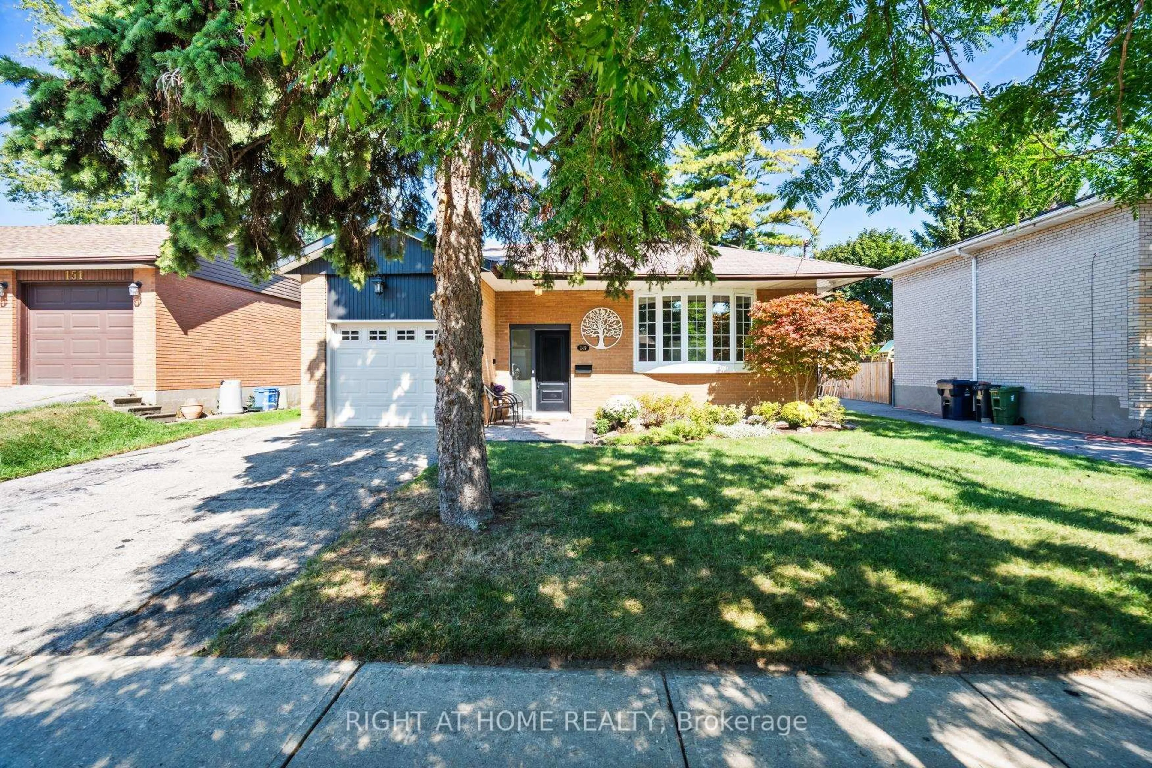 Home with brick exterior material, street for 149 Greyabbey Tr, Toronto Ontario M1E 1W2