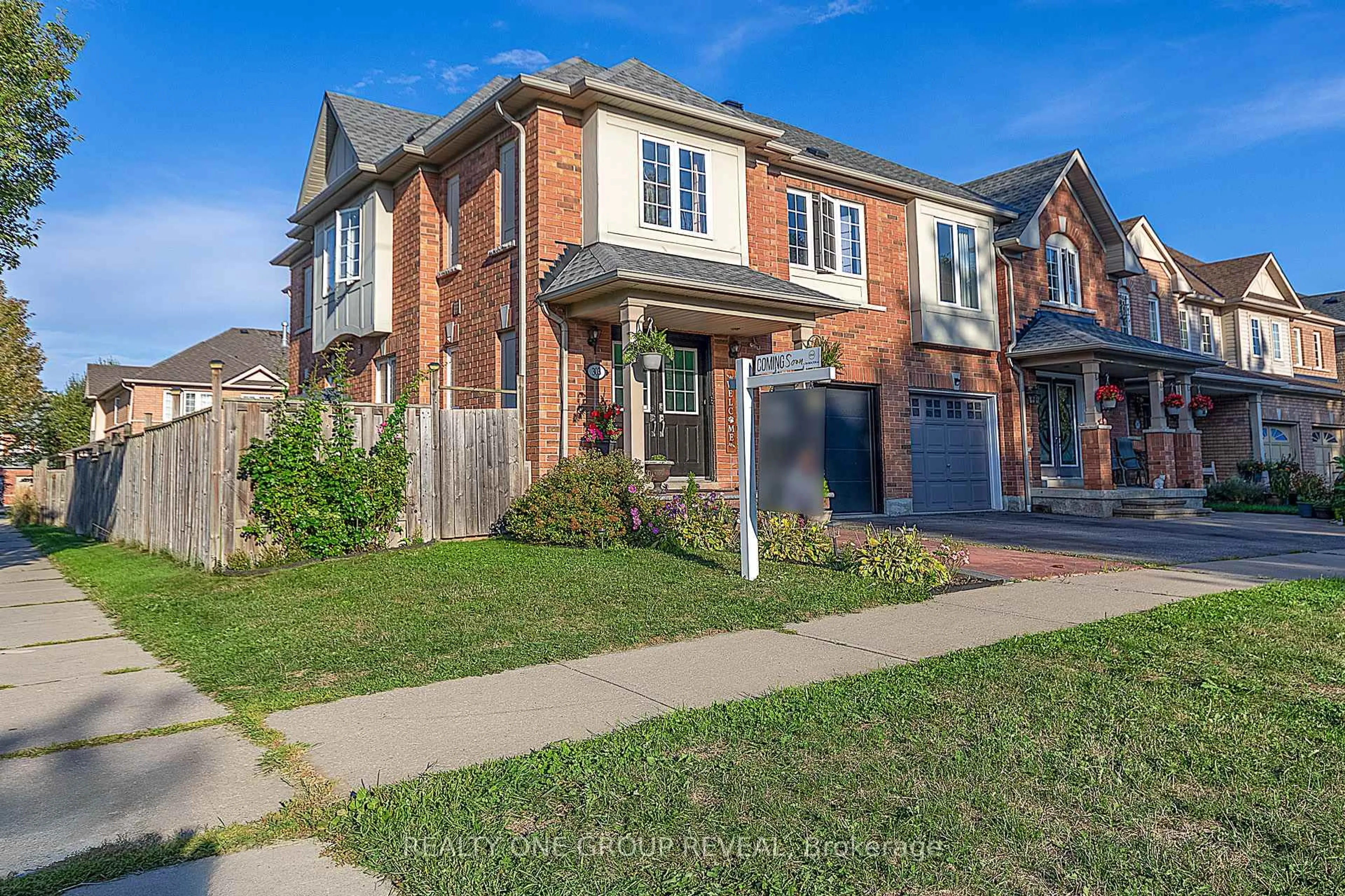 Home with brick exterior material, street for 303 Porte Rd, Ajax Ontario L1S 0A4