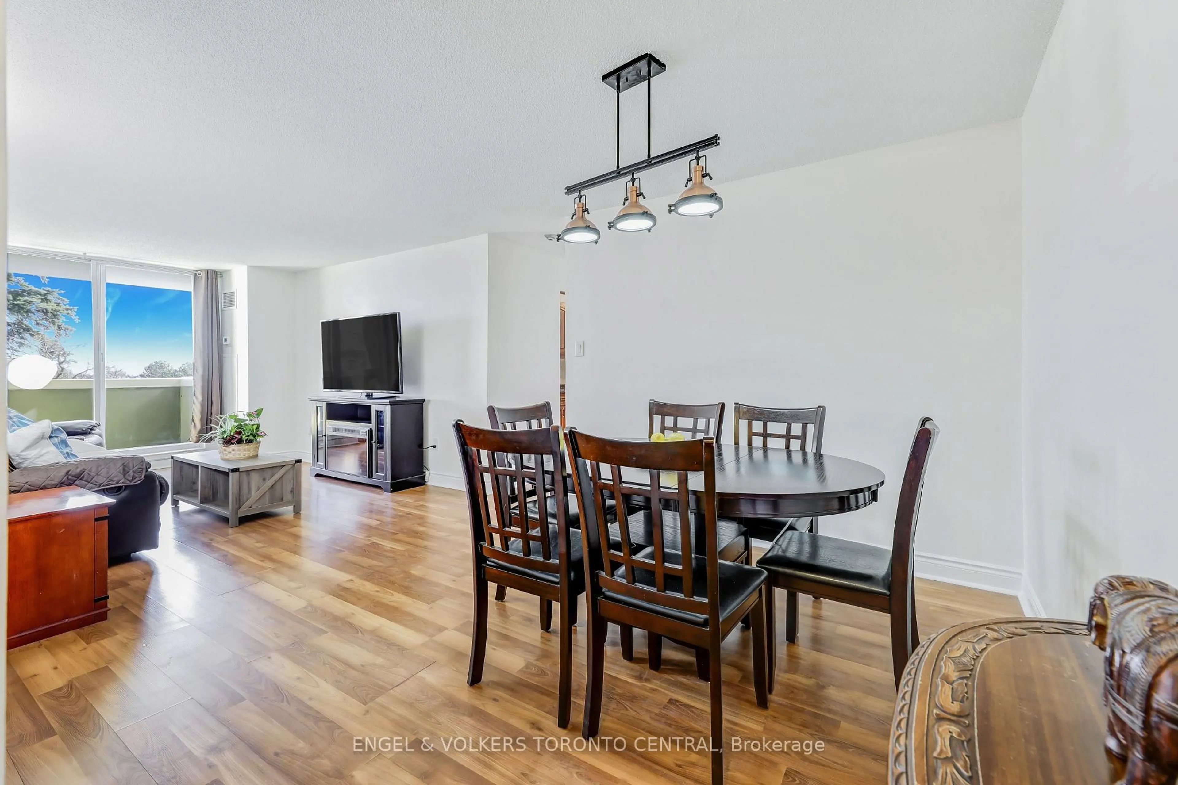 Dining room, wood/laminate floor for 15 Sewells Rd #207, Toronto Ontario M1B 3V7