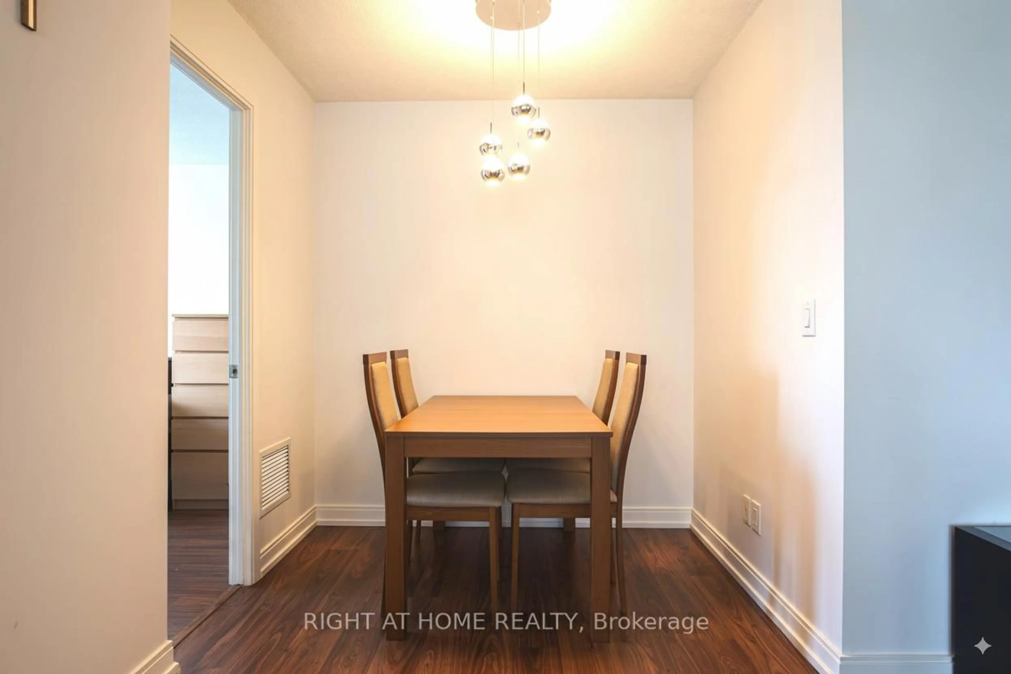 Dining room, wood/laminate floor for 151 Village Green Sq #908, Toronto Ontario M1S 0K5