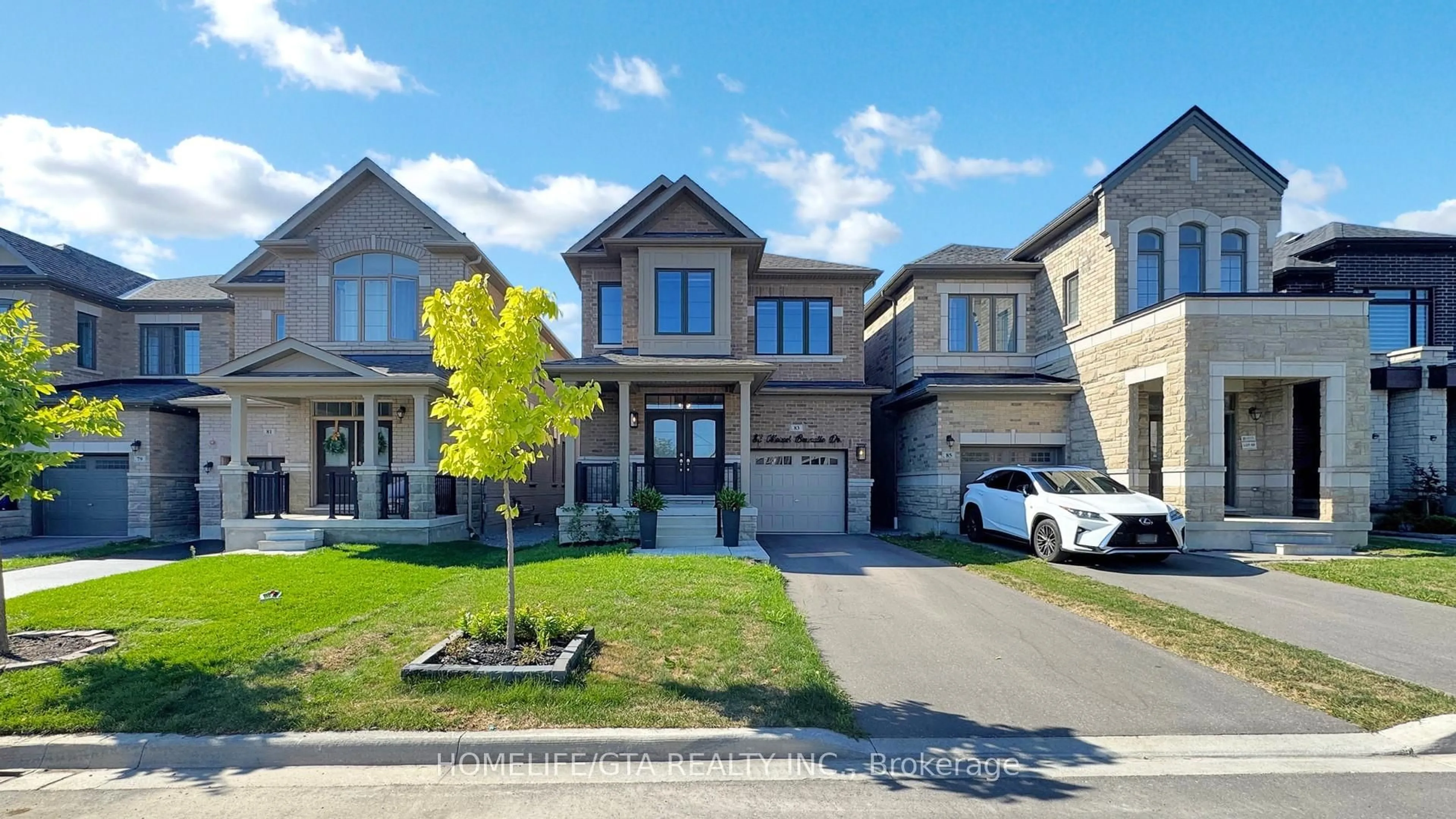 Home with brick exterior material, street for 83 Marcel Brunelle Dr, Whitby Ontario L1P 0G9