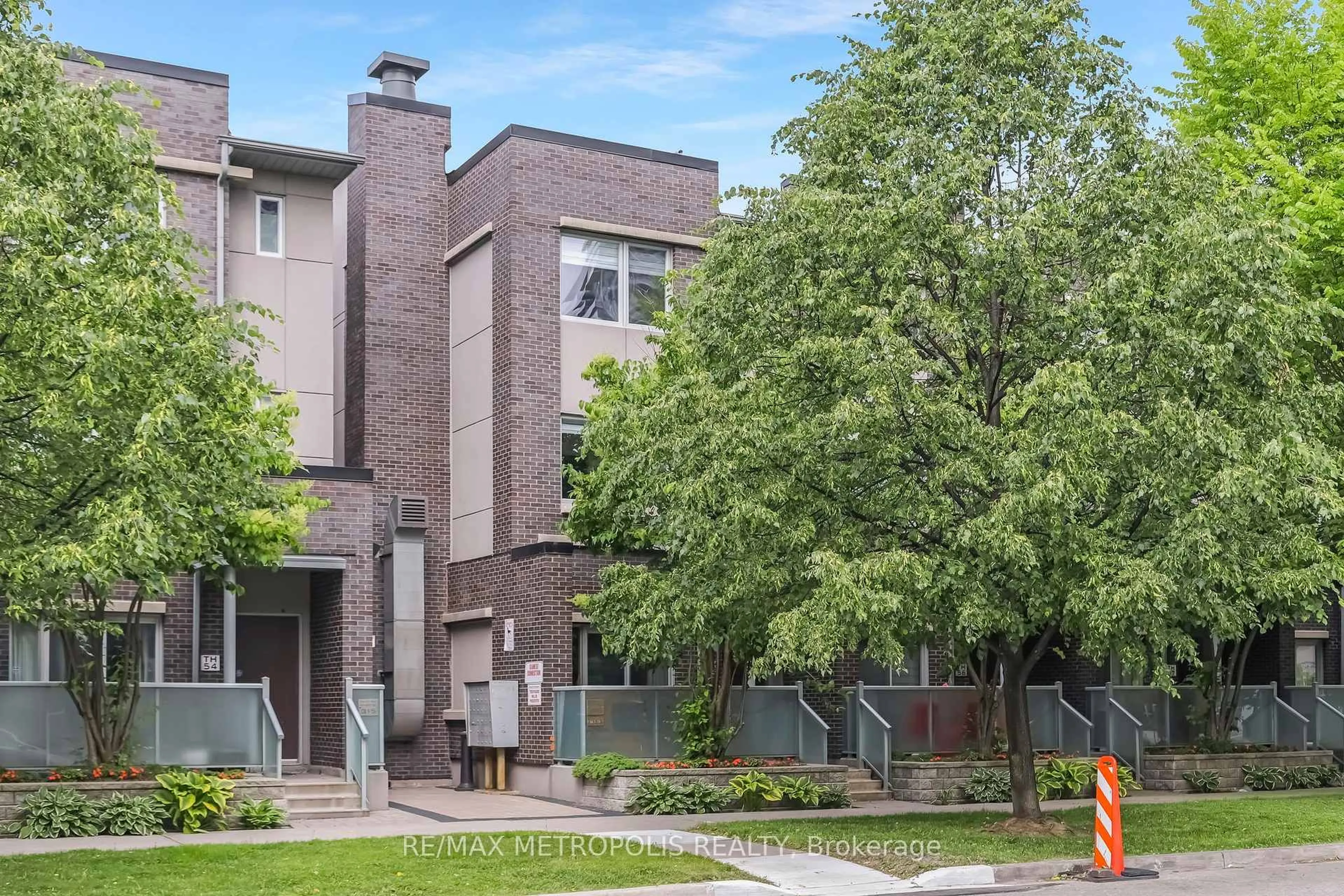 Home with brick exterior material, street for 295 Village Green Sq #TH55, Toronto Ontario M1S 0L2