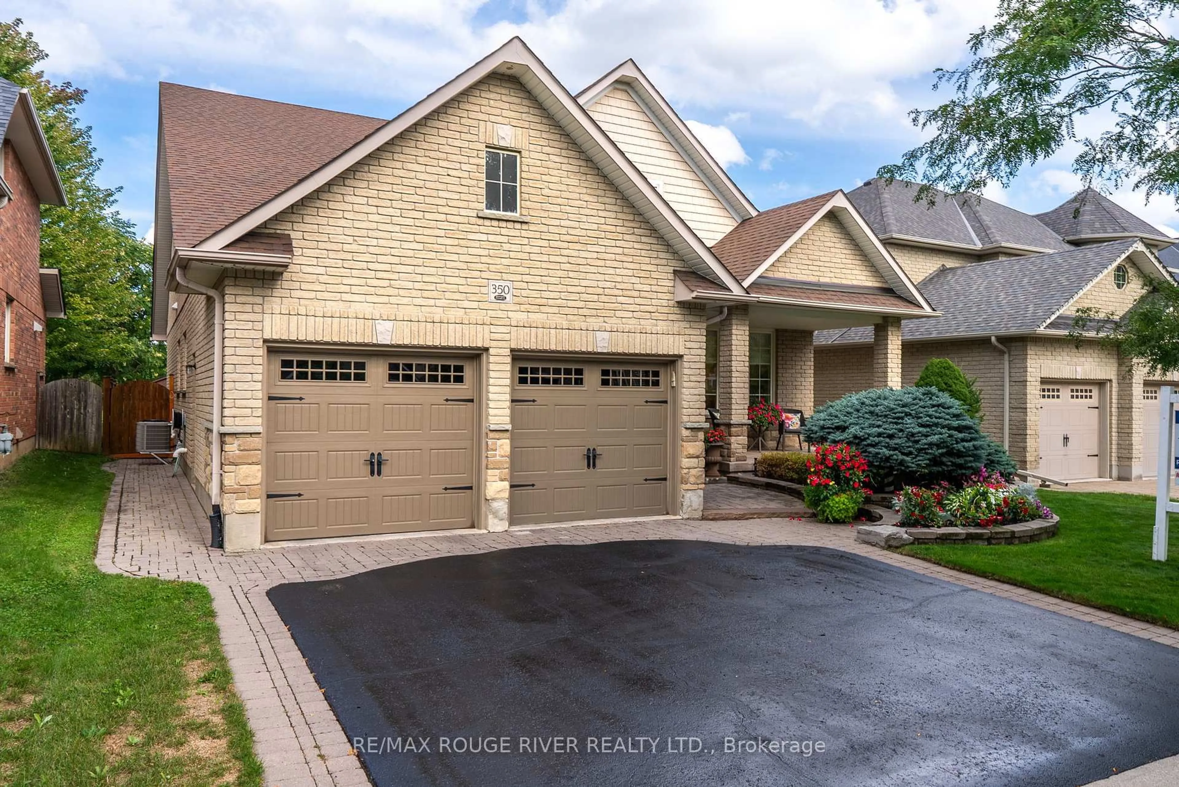 Home with brick exterior material, street for 350 Raike Dr, Oshawa Ontario L1L 0B1