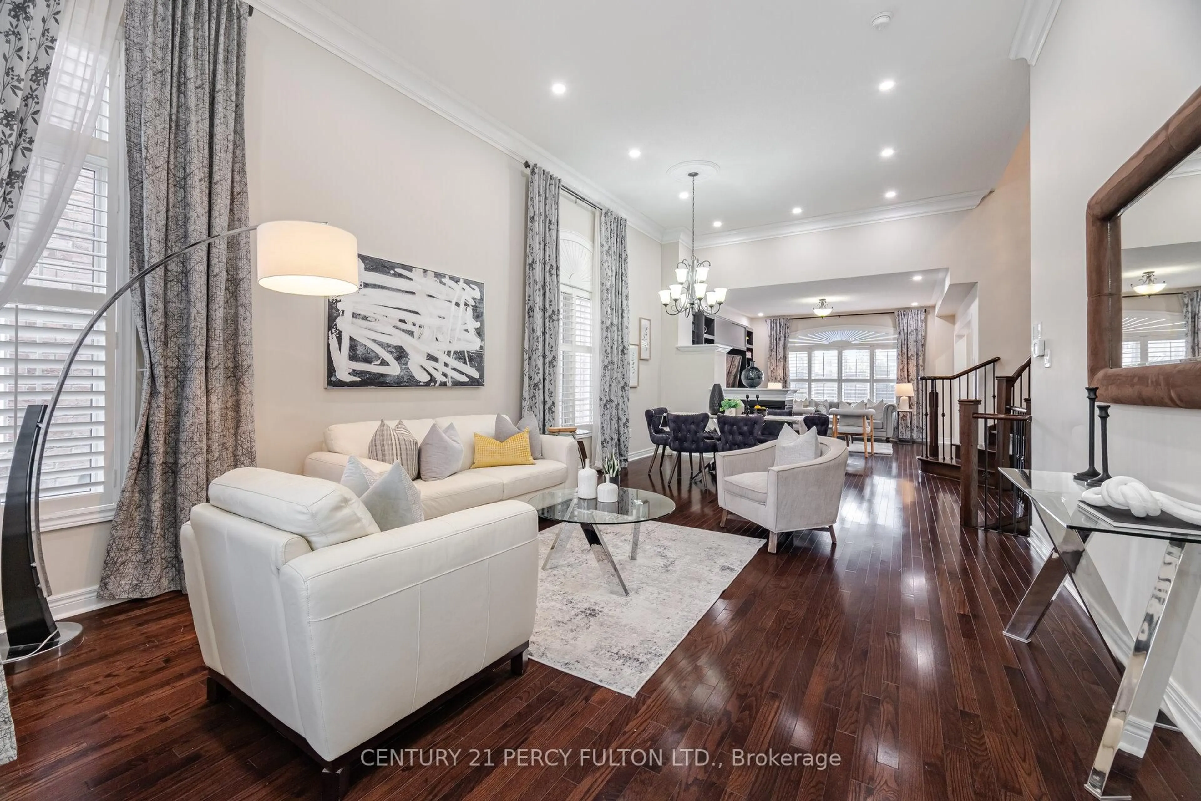 Living room with furniture, wood/laminate floor for 14 Snowling Dr, Ajax Ontario L1Z 0M2