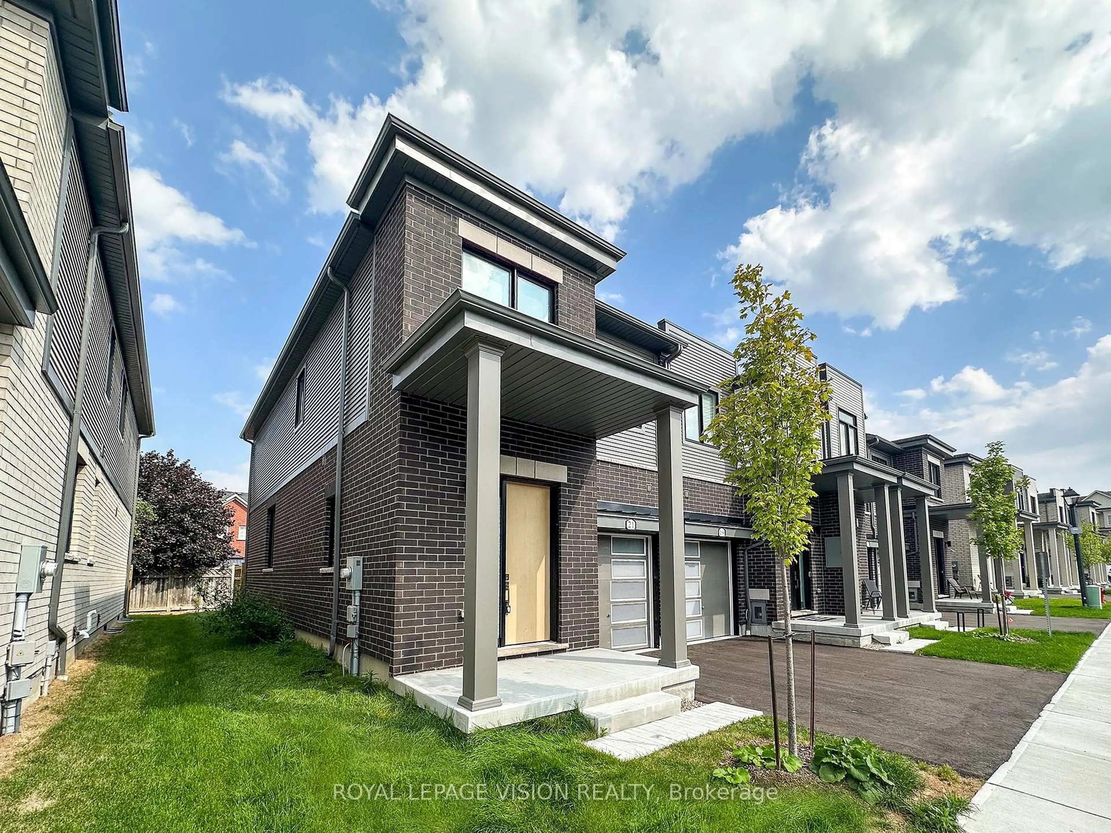 Home with brick exterior material, street for 21 Sorbara Way, Whitby Ontario L1M 0M4