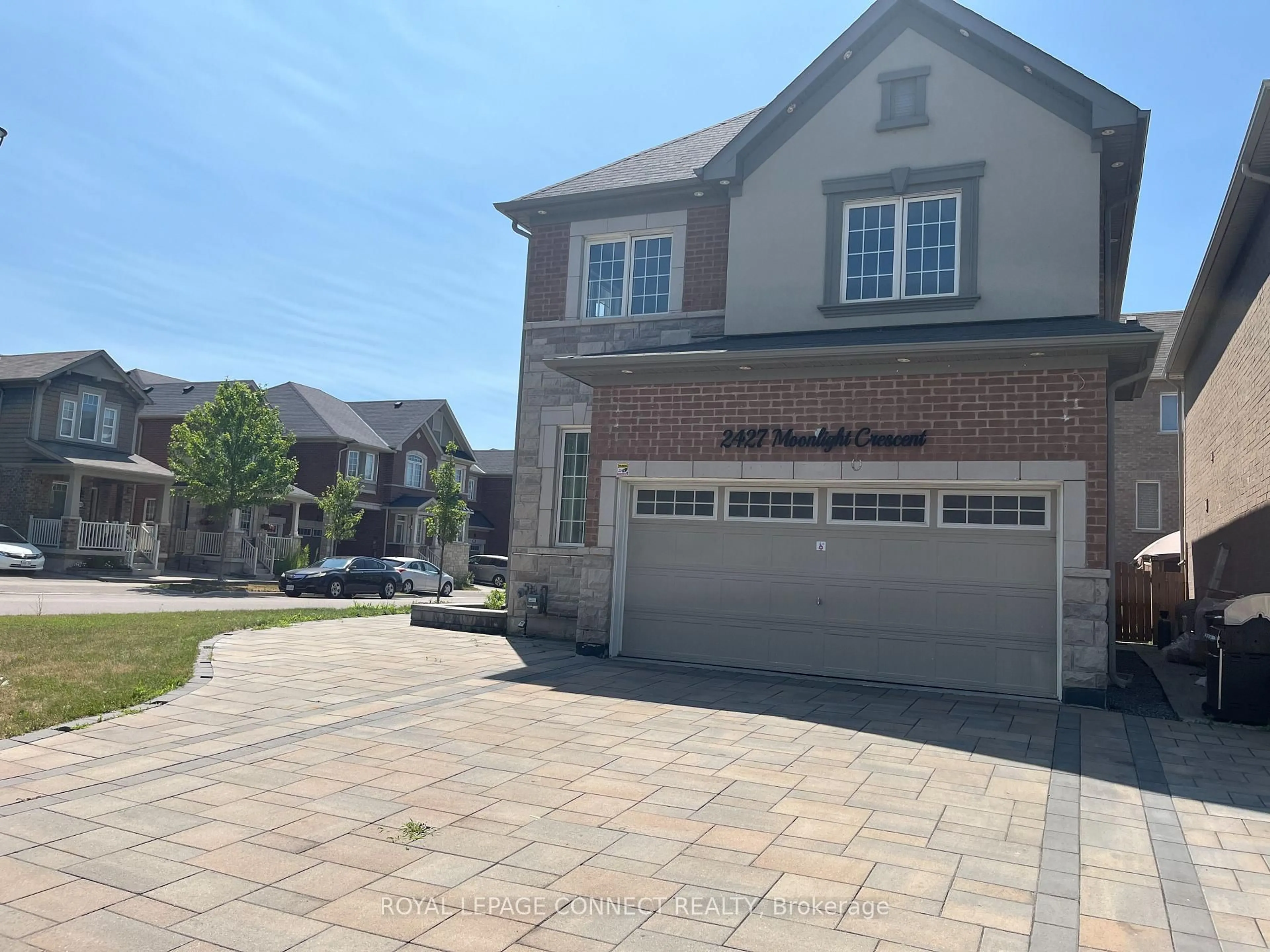 Home with brick exterior material, street for 2427 Moonlight Cres, Pickering Ontario L1X 0E9
