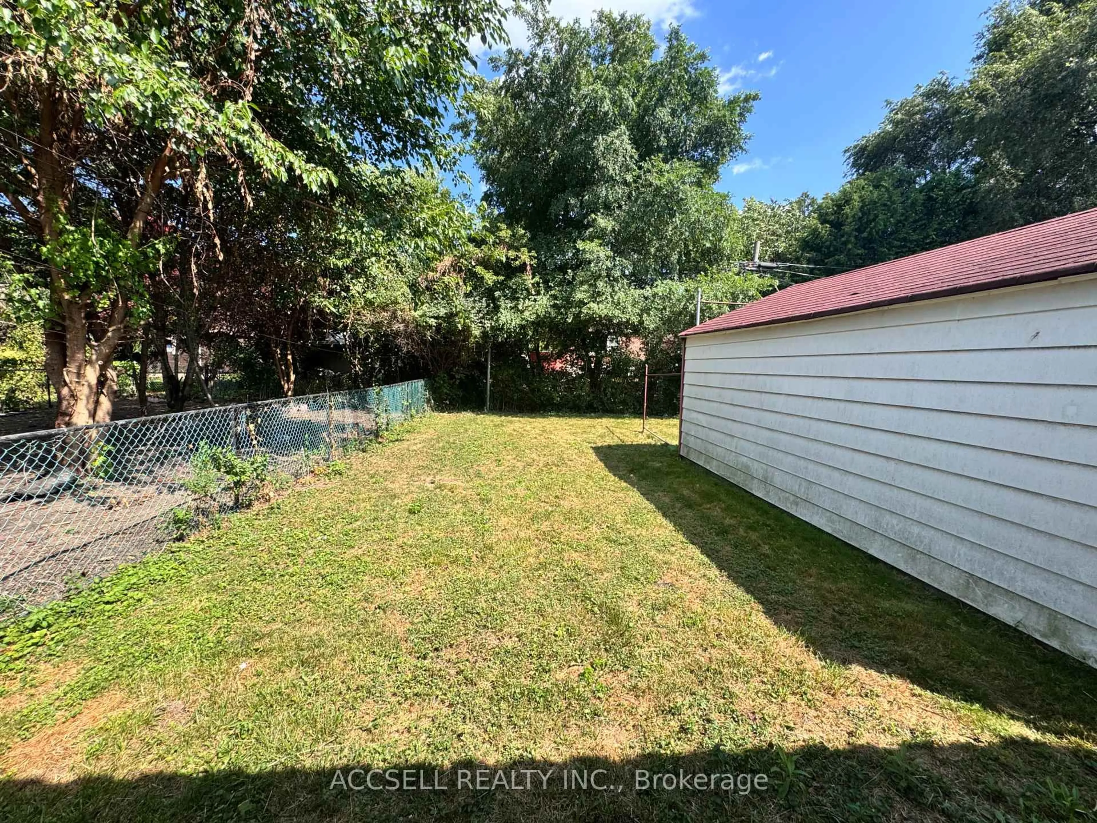 A pic from outside/outdoor area/front of a property/back of a property/a pic from drone, forest/trees view for 493 Dawes Rd, Toronto Ontario M4B 2G5