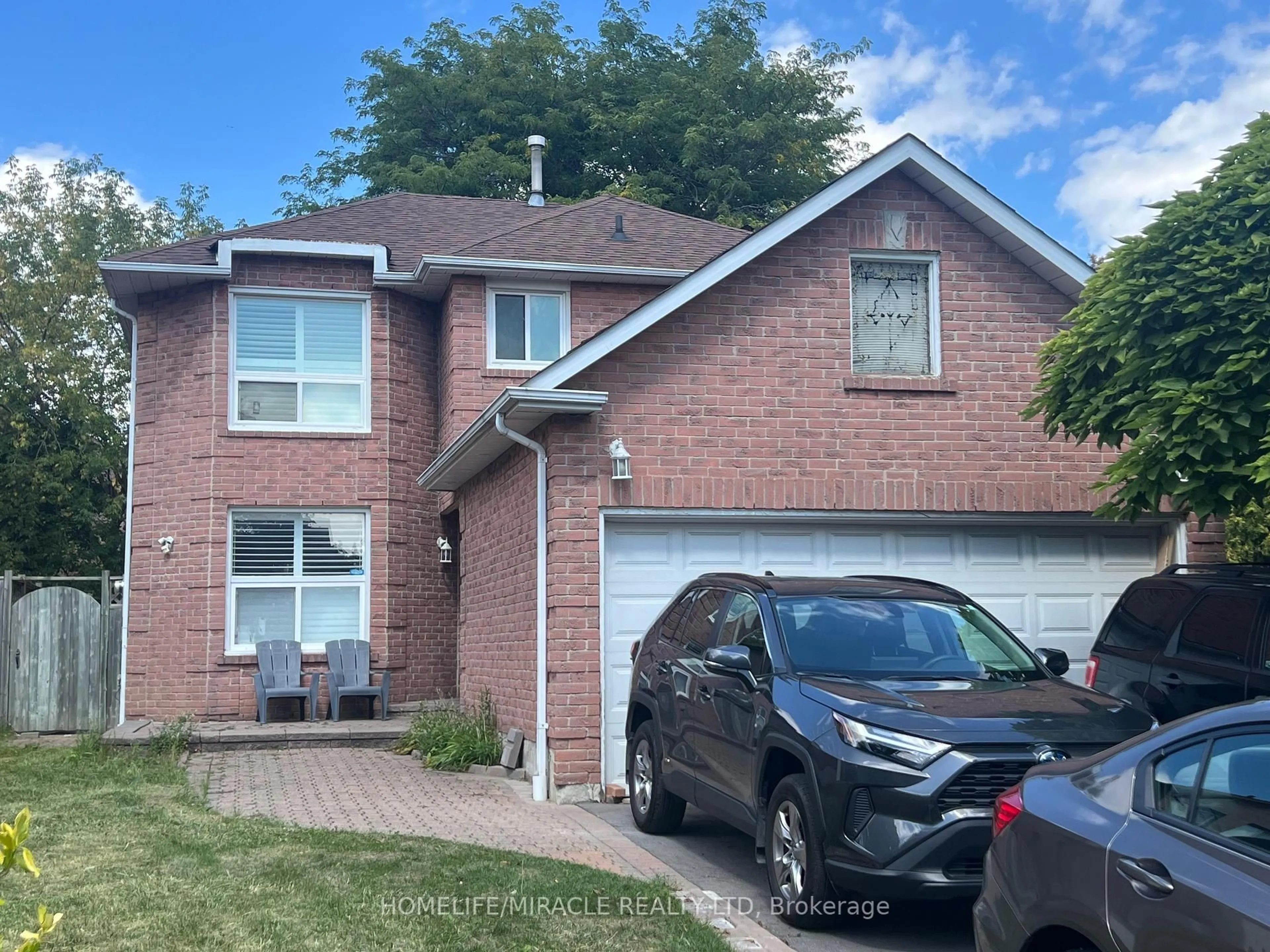 Home with brick exterior material, street for 32 Lachlan Dr, Ajax Ontario L1T 1N6