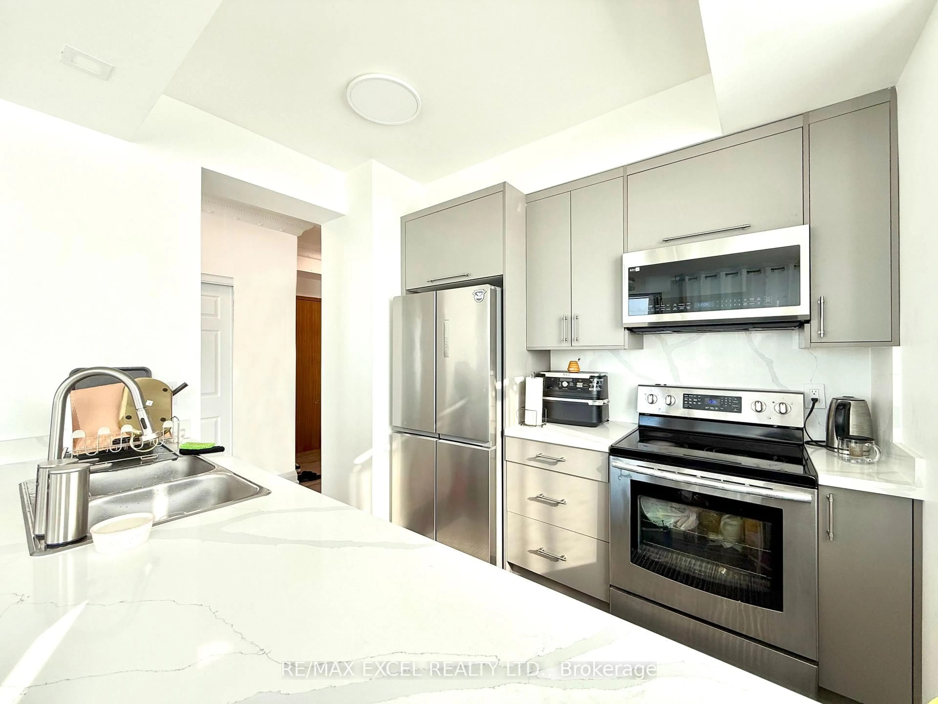 Contemporary kitchen, ceramic/tile floor for 60 Brian Harrison Way #ph3703, Toronto Ontario M1P 5J5