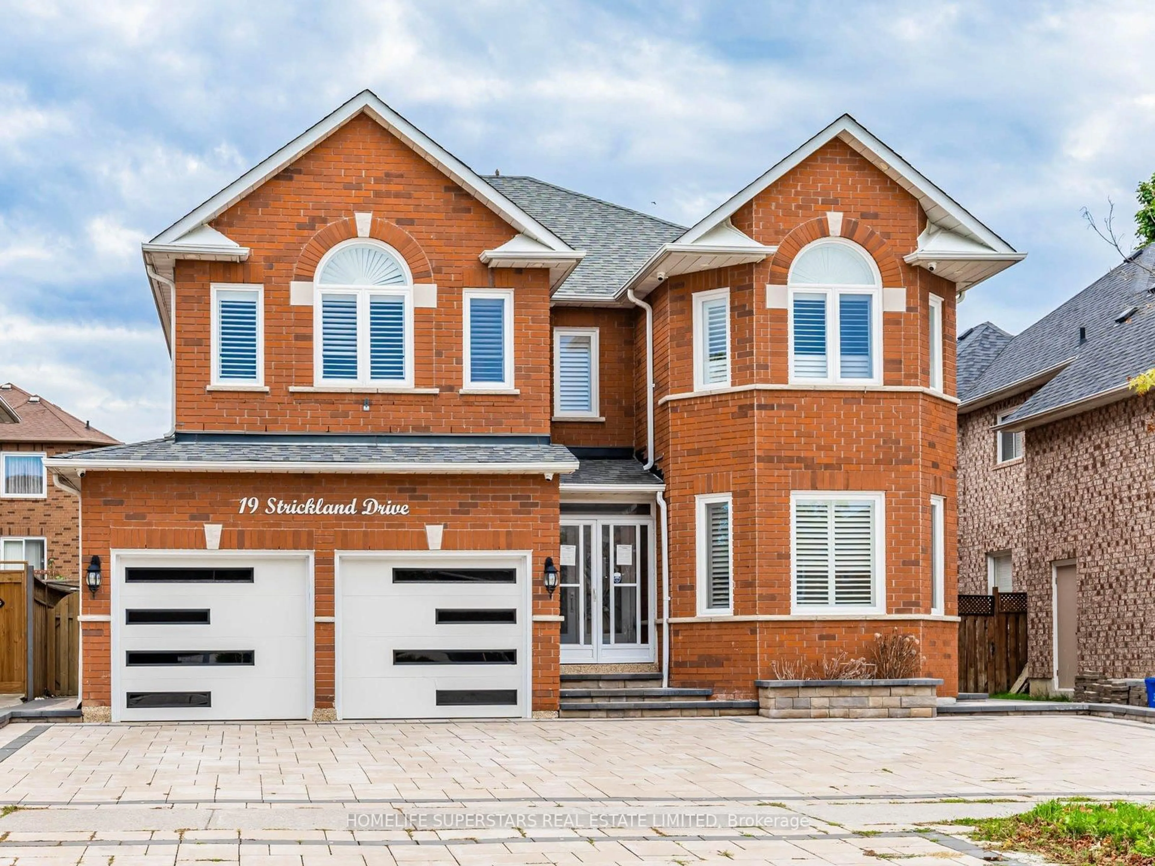 Home with brick exterior material, street for 19 Strickland Dr, Ajax Ontario L1T 4A1