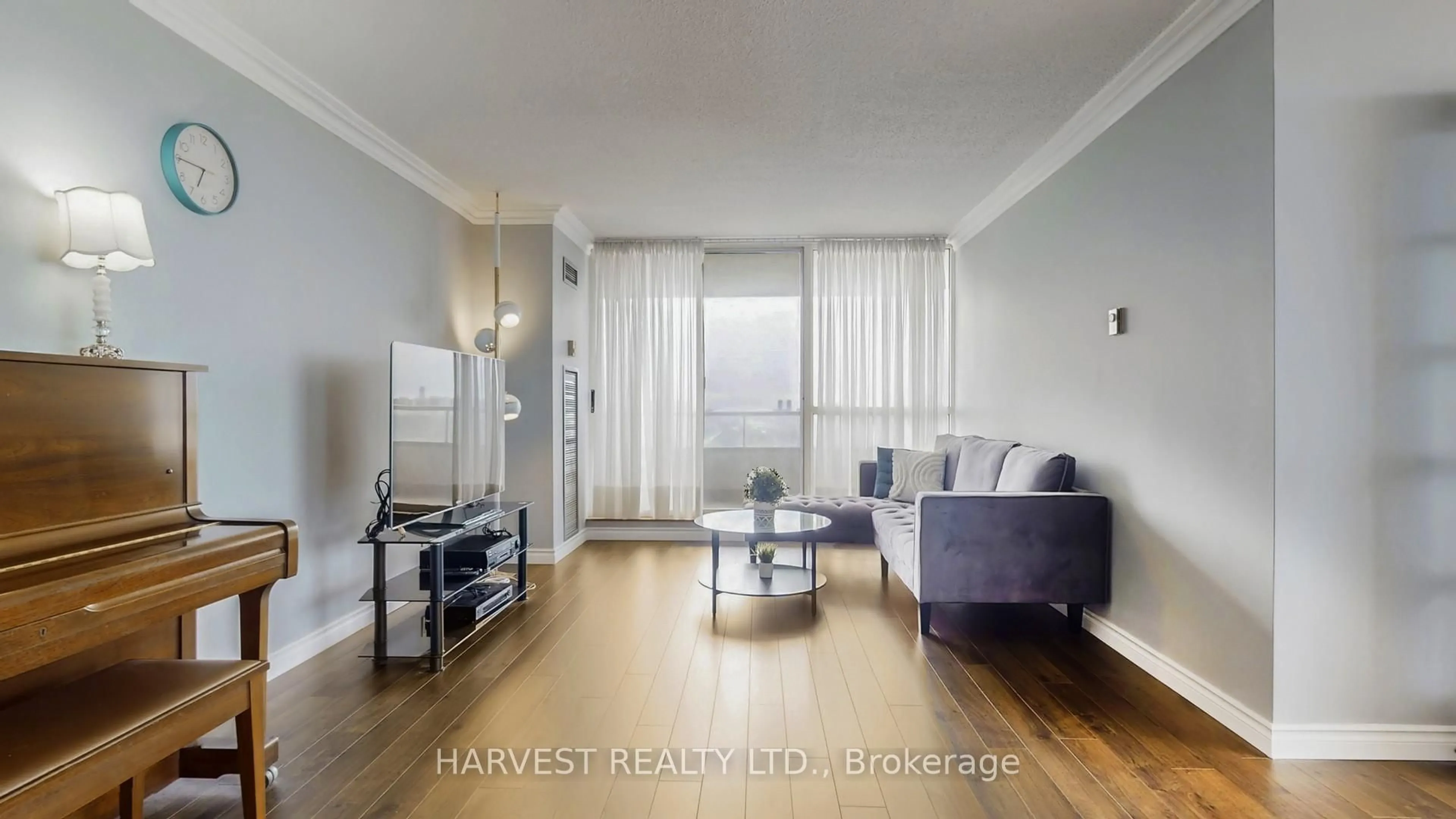 Living room with furniture, wood/laminate floor for 175 Bamburgh Circ #1703, Toronto Ontario M1W 3X8