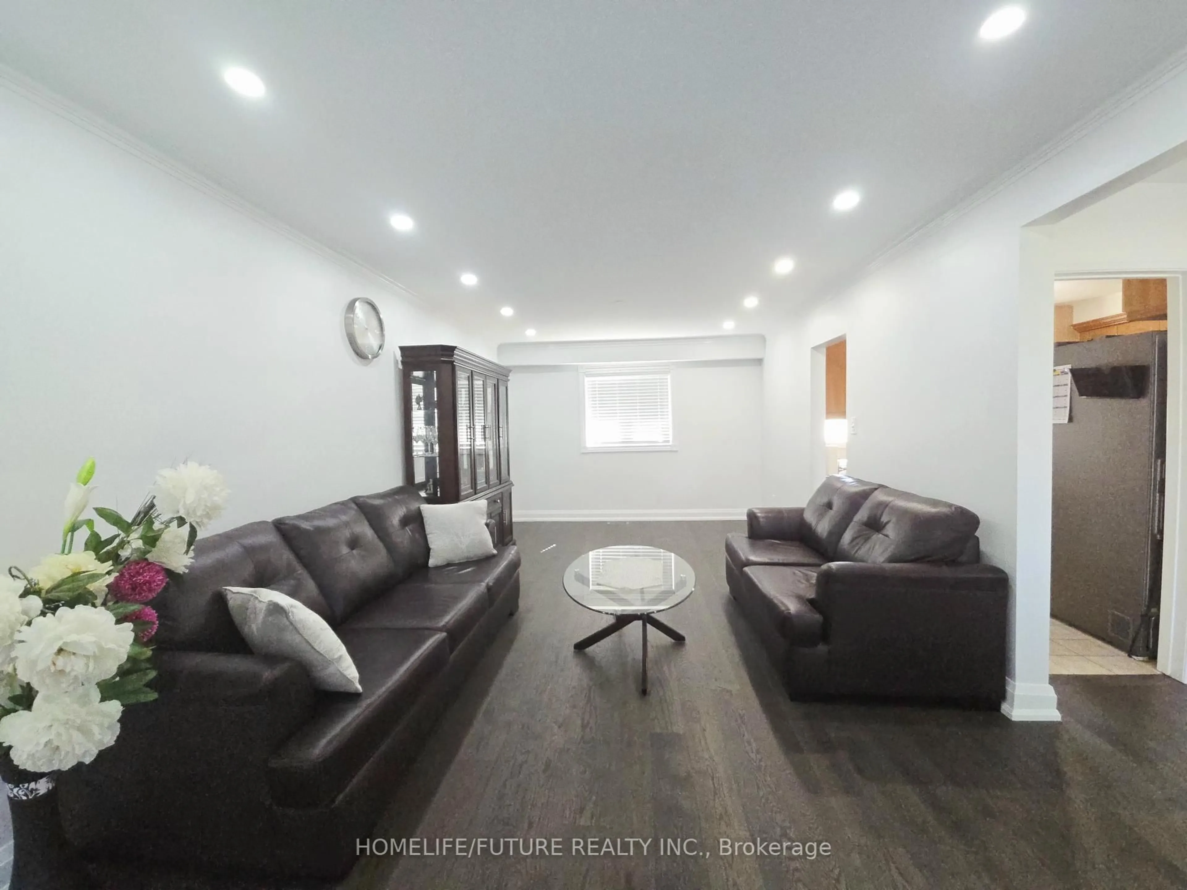 Living room with furniture, wood/laminate floor for 14 Pelmar Pl, Toronto Ontario M1G 1G5