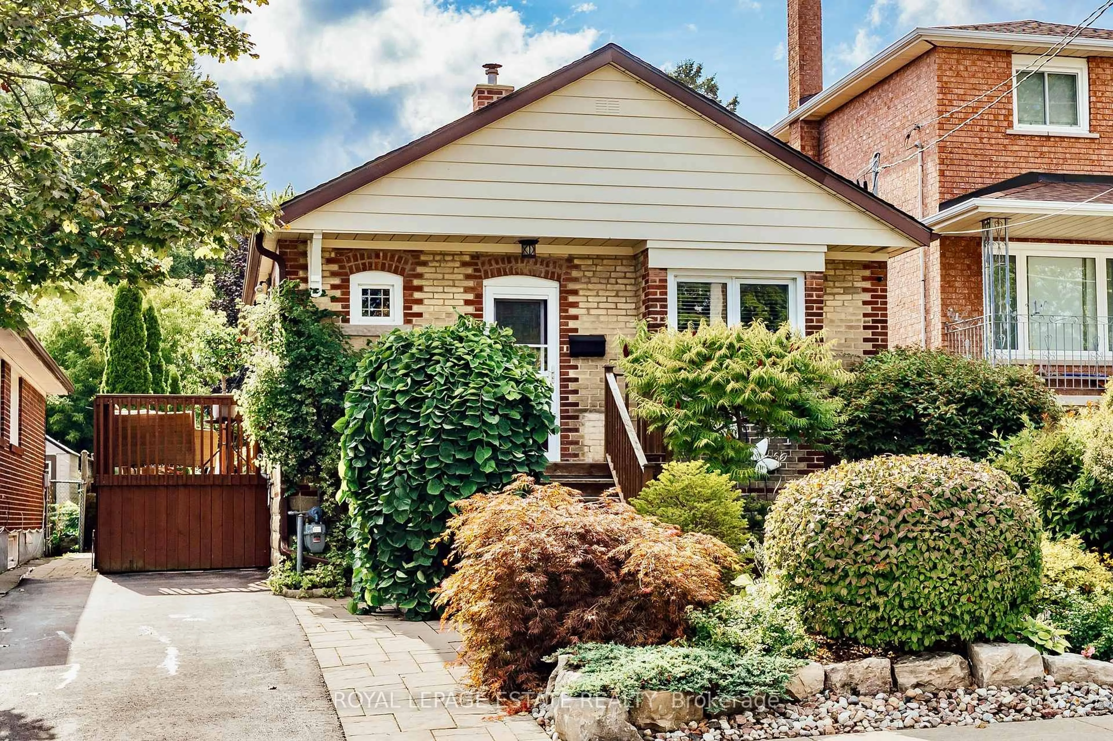 Home with brick exterior material, street for 92 South Woodrow Blvd, Toronto Ontario M1N 3L7