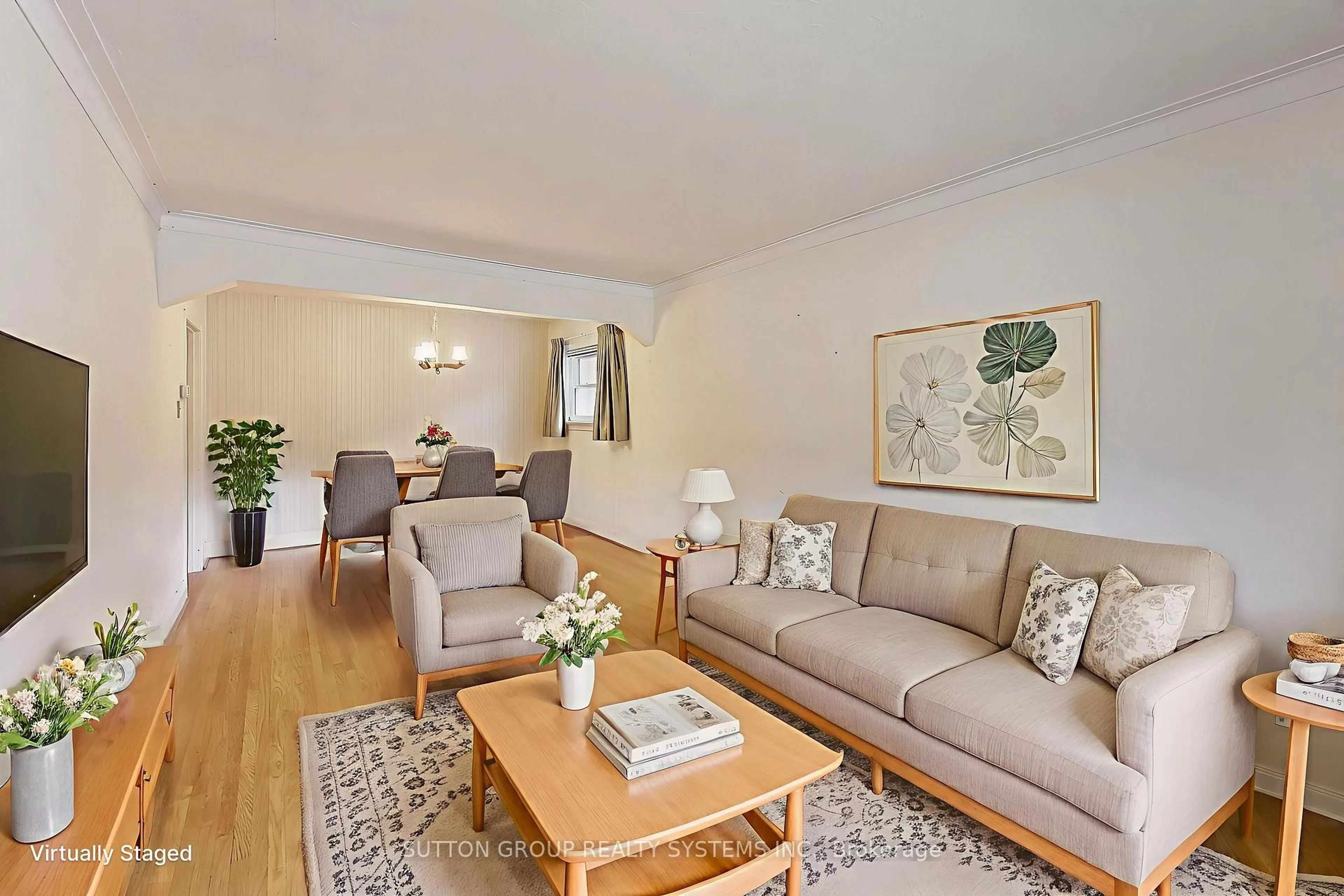 Living room with furniture, wood/laminate floor for 31 Doris Dr, Toronto Ontario M4B 3C7