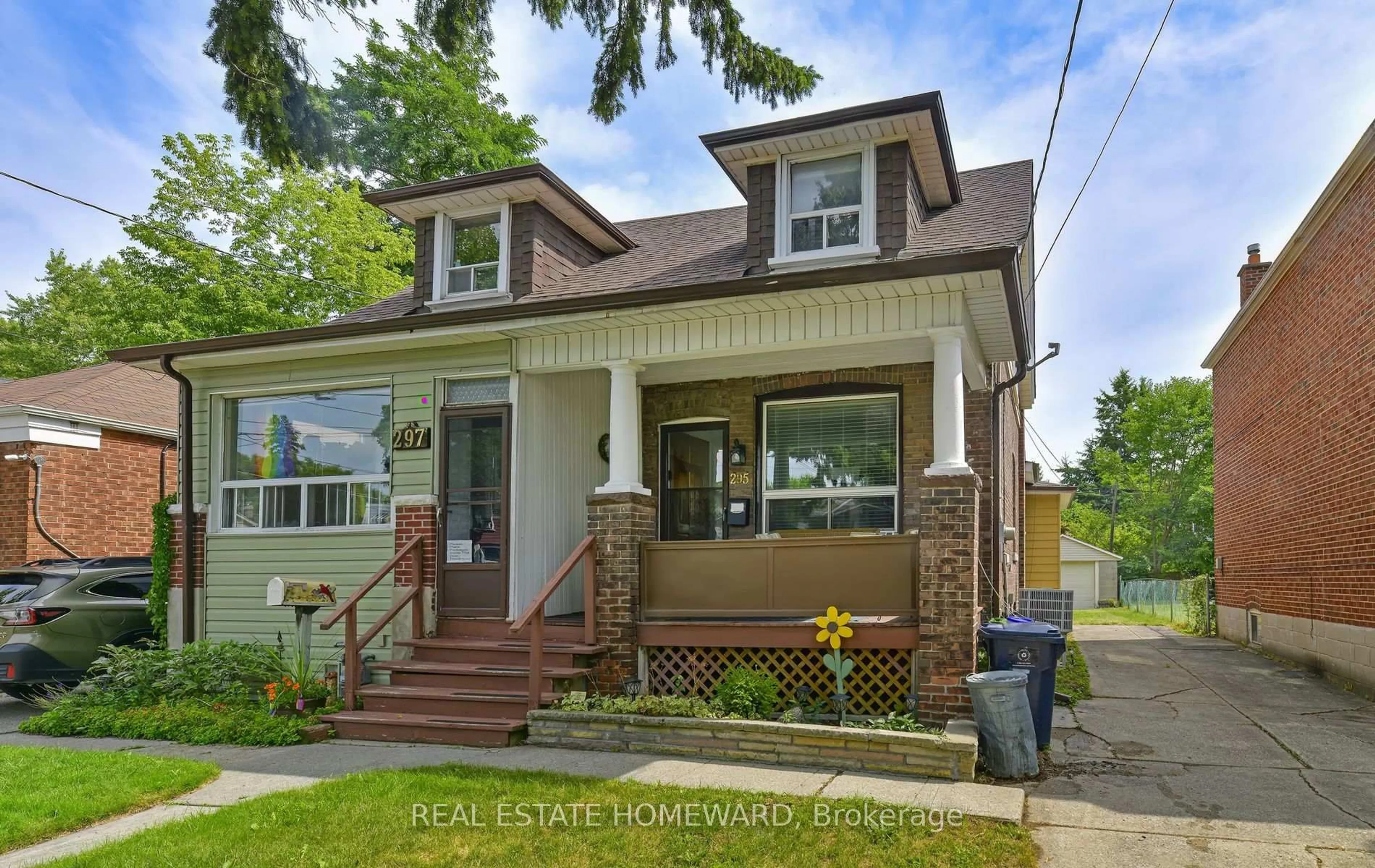 Home with brick exterior material, street for 295 Chisholm Ave, Toronto Ontario M4C 4W5
