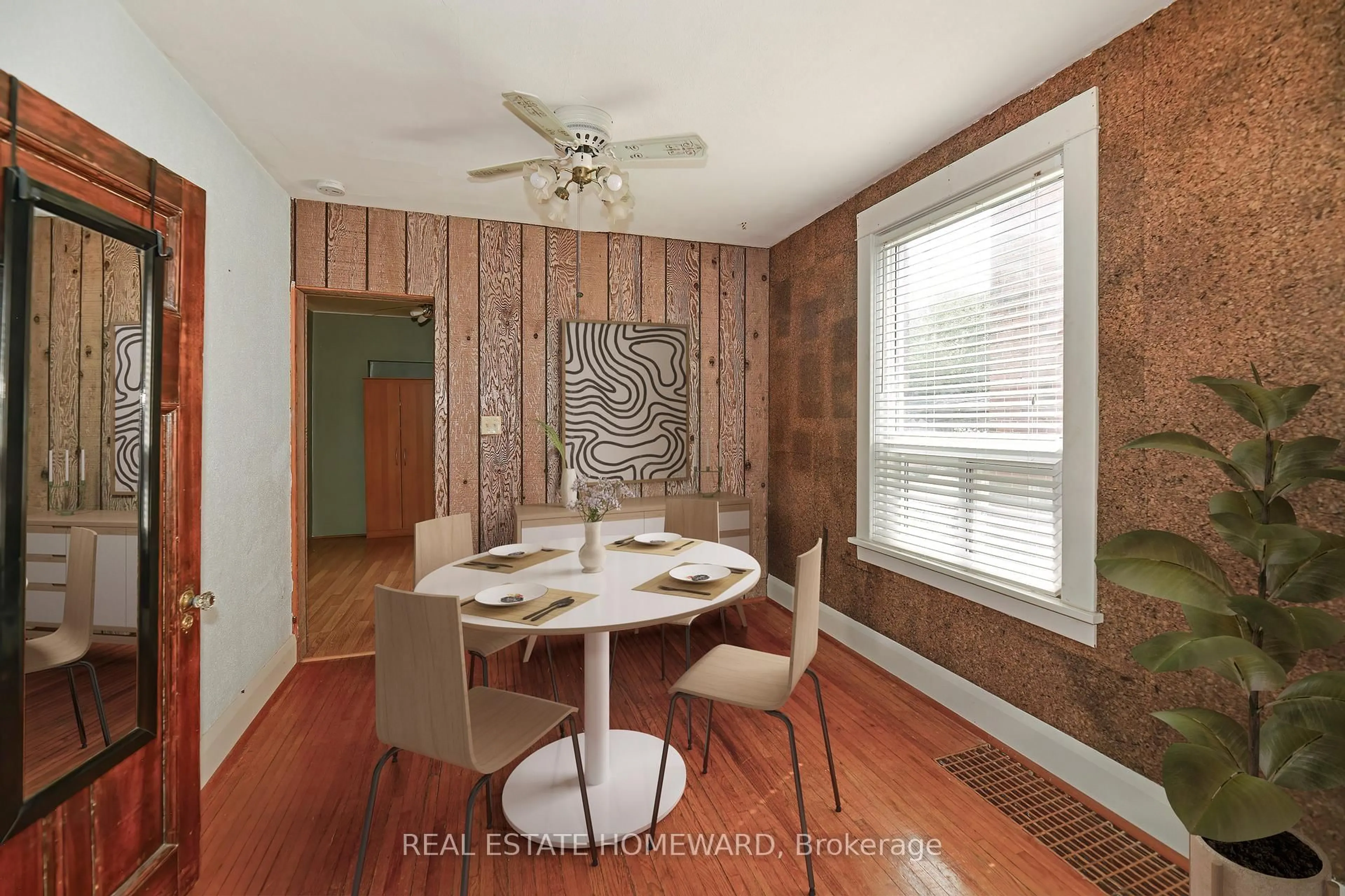 Dining room, wood/laminate floor for 295 Chisholm Ave, Toronto Ontario M4C 4W5