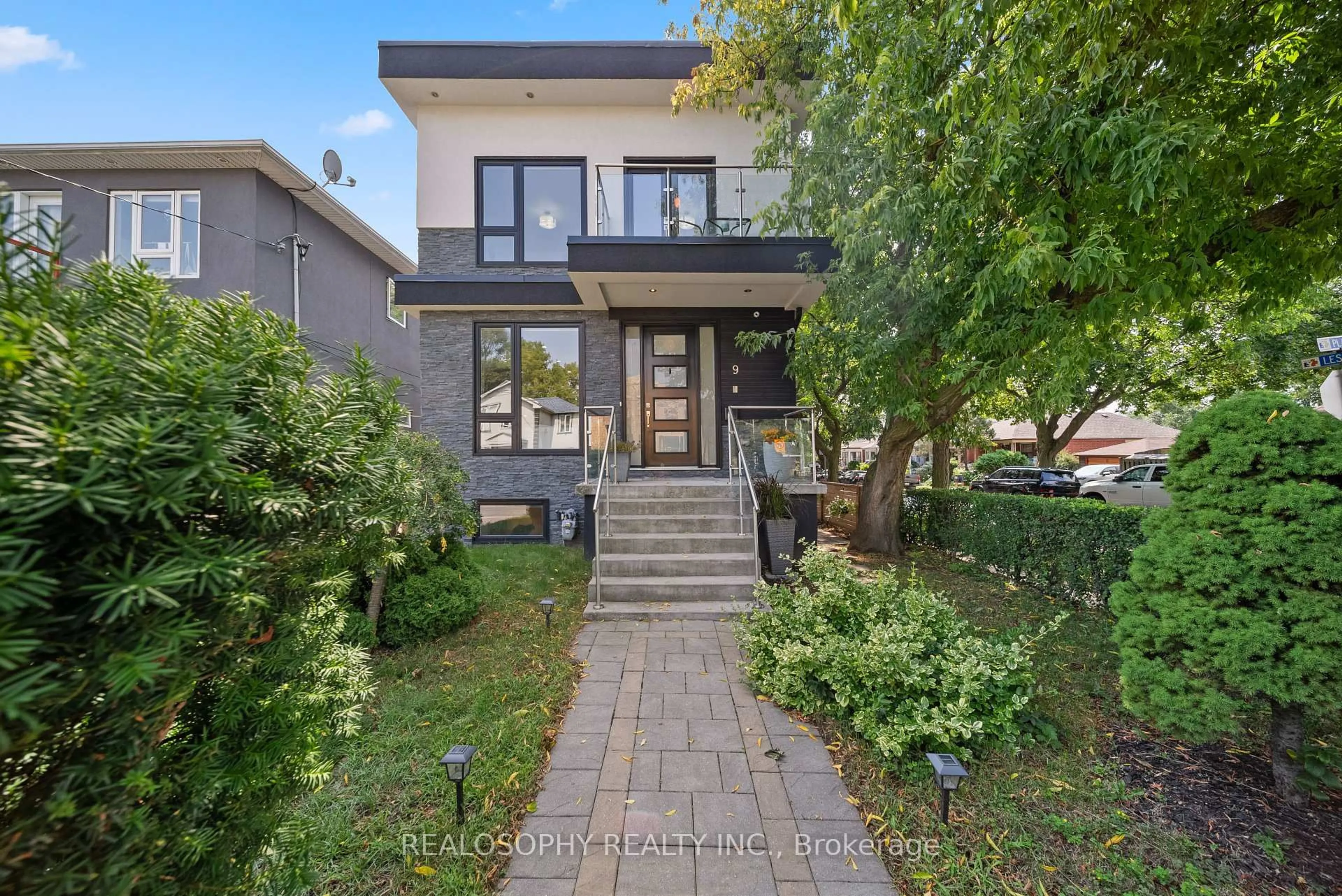 Home with brick exterior material, street for 9 Plains Rd, Toronto Ontario M4J 2P9