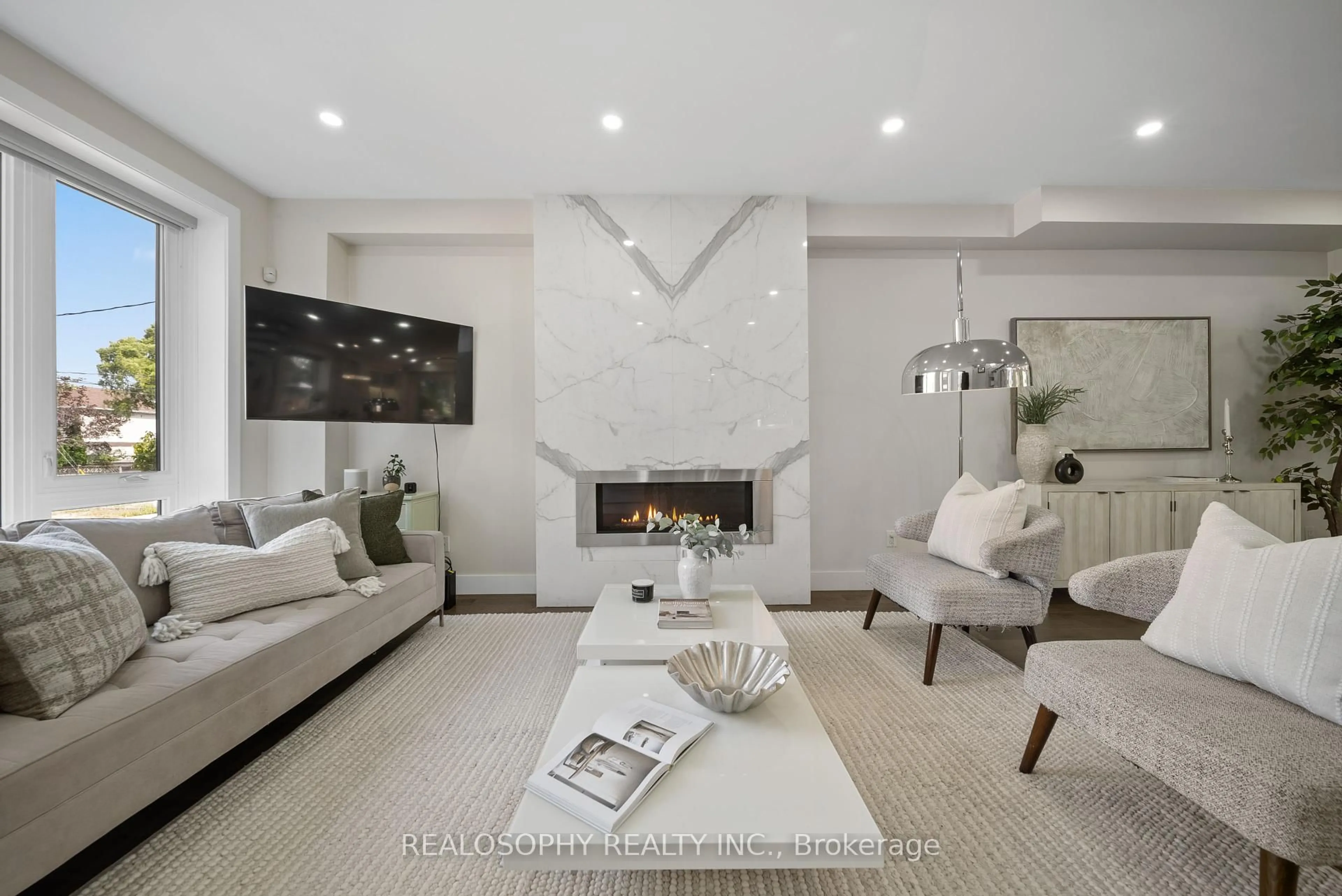 Living room with furniture, ceramic/tile floor for 9 Plains Rd, Toronto Ontario M4J 2P9