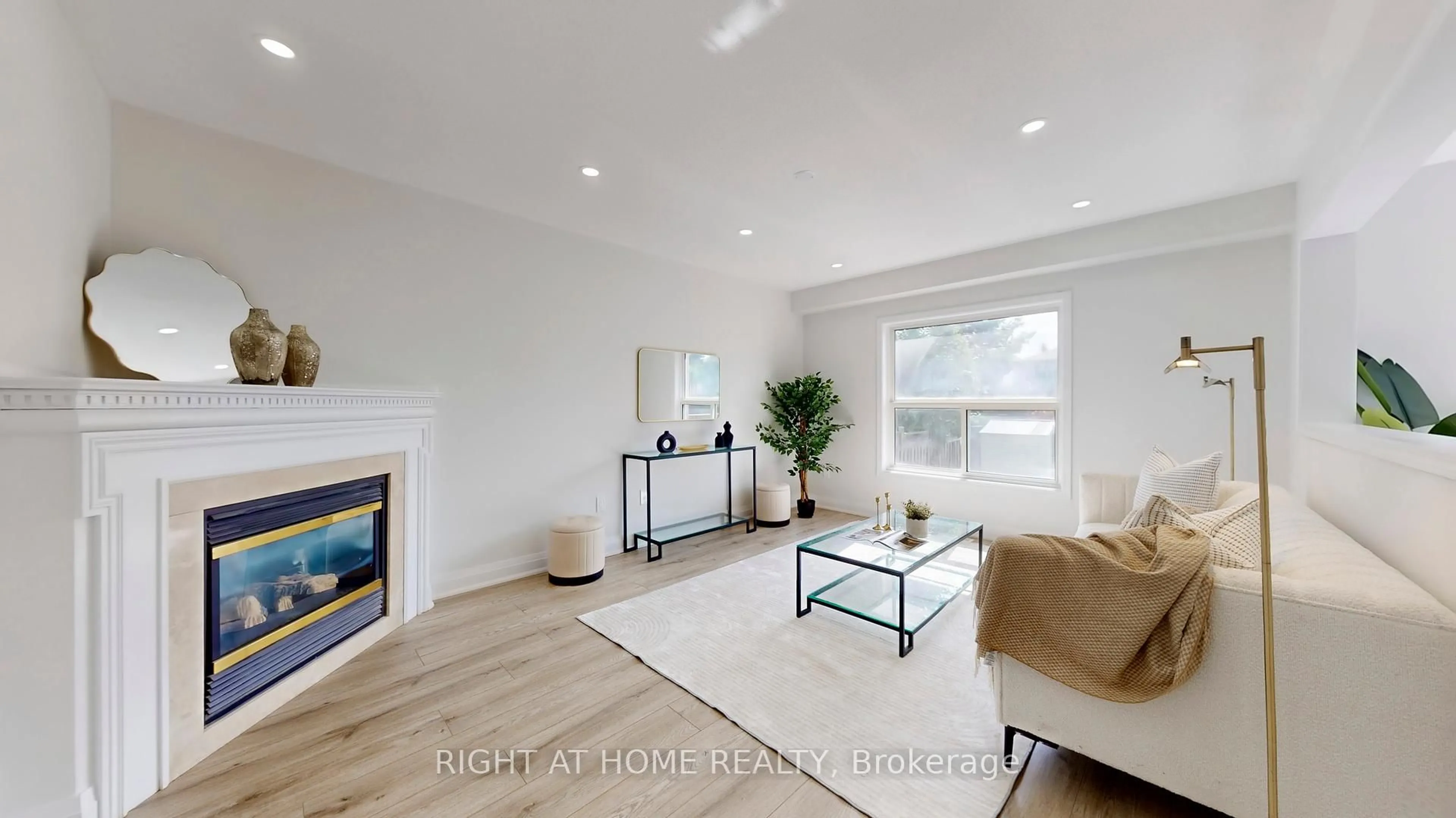 Living room with furniture, wood/laminate floor for 55 Tilley Rd, Clarington Ontario L1C 4M3