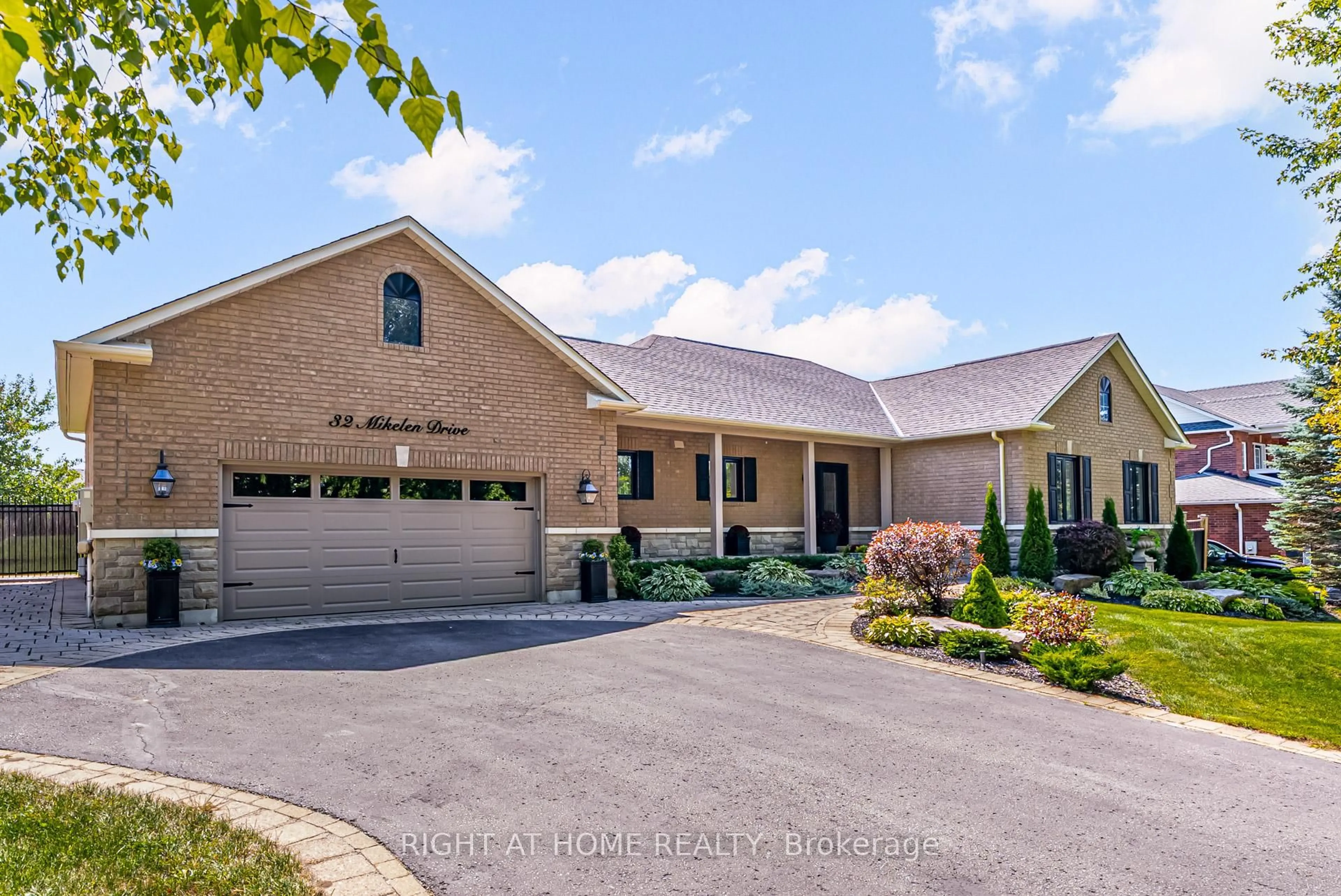 Home with brick exterior material, street for 32 Mikelen Dr, Scugog Ontario L9L 1V1