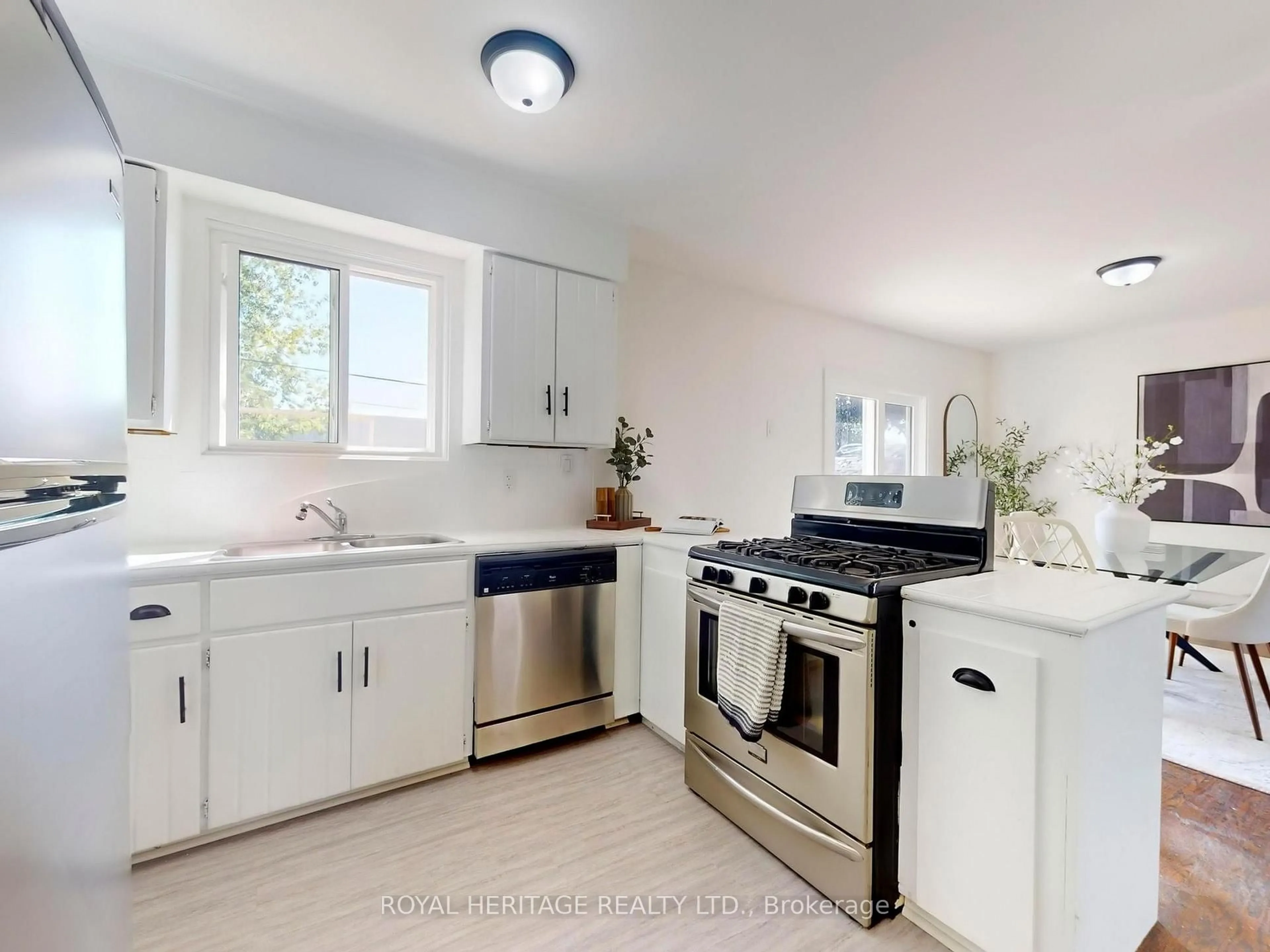 Open concept kitchen, ceramic/tile floor for 1002 McCullough Dr, Whitby Ontario L1N 1C6