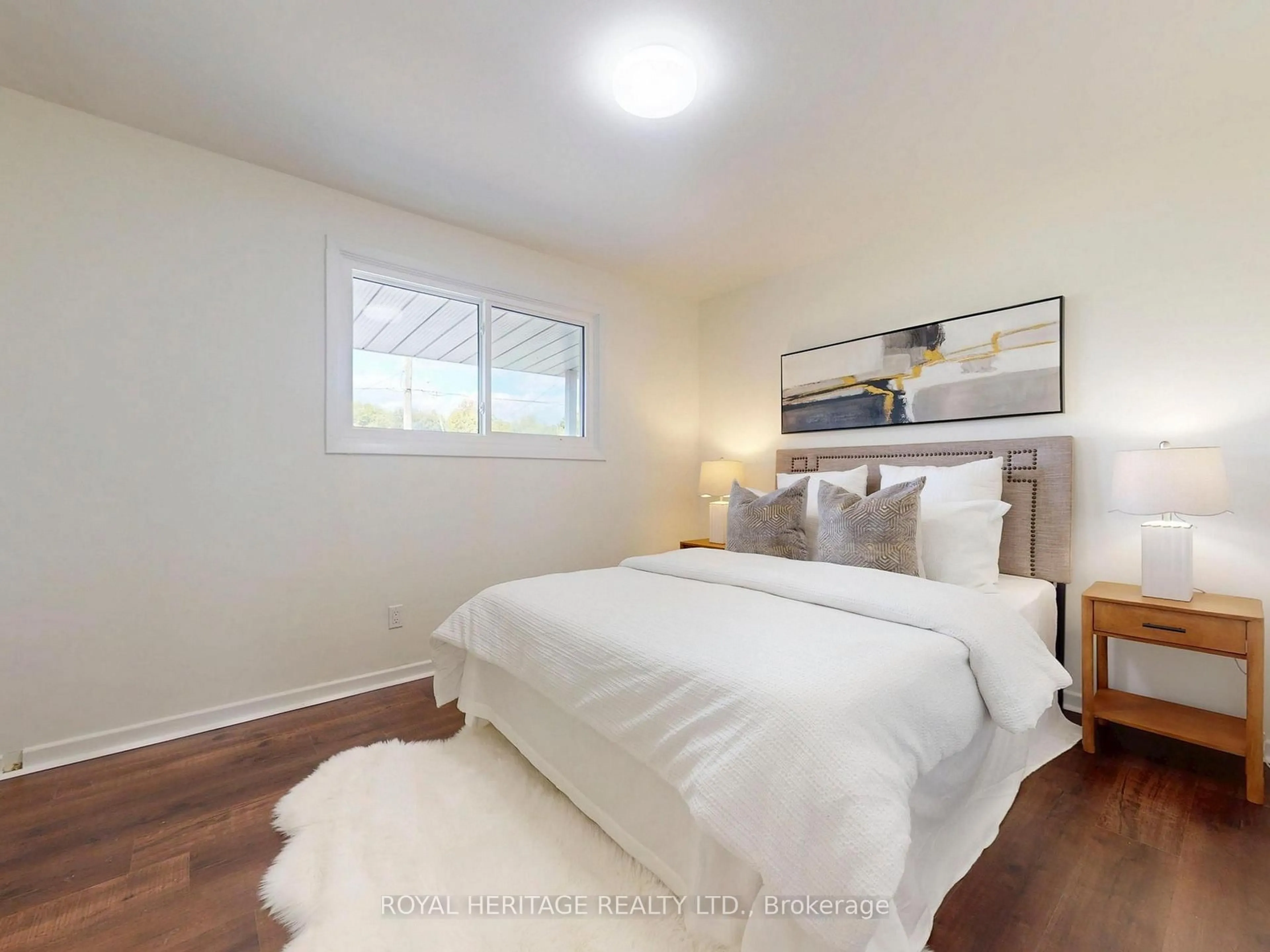 Bedroom with bed, wood/laminate floor for 1002 McCullough Dr, Whitby Ontario L1N 1C6