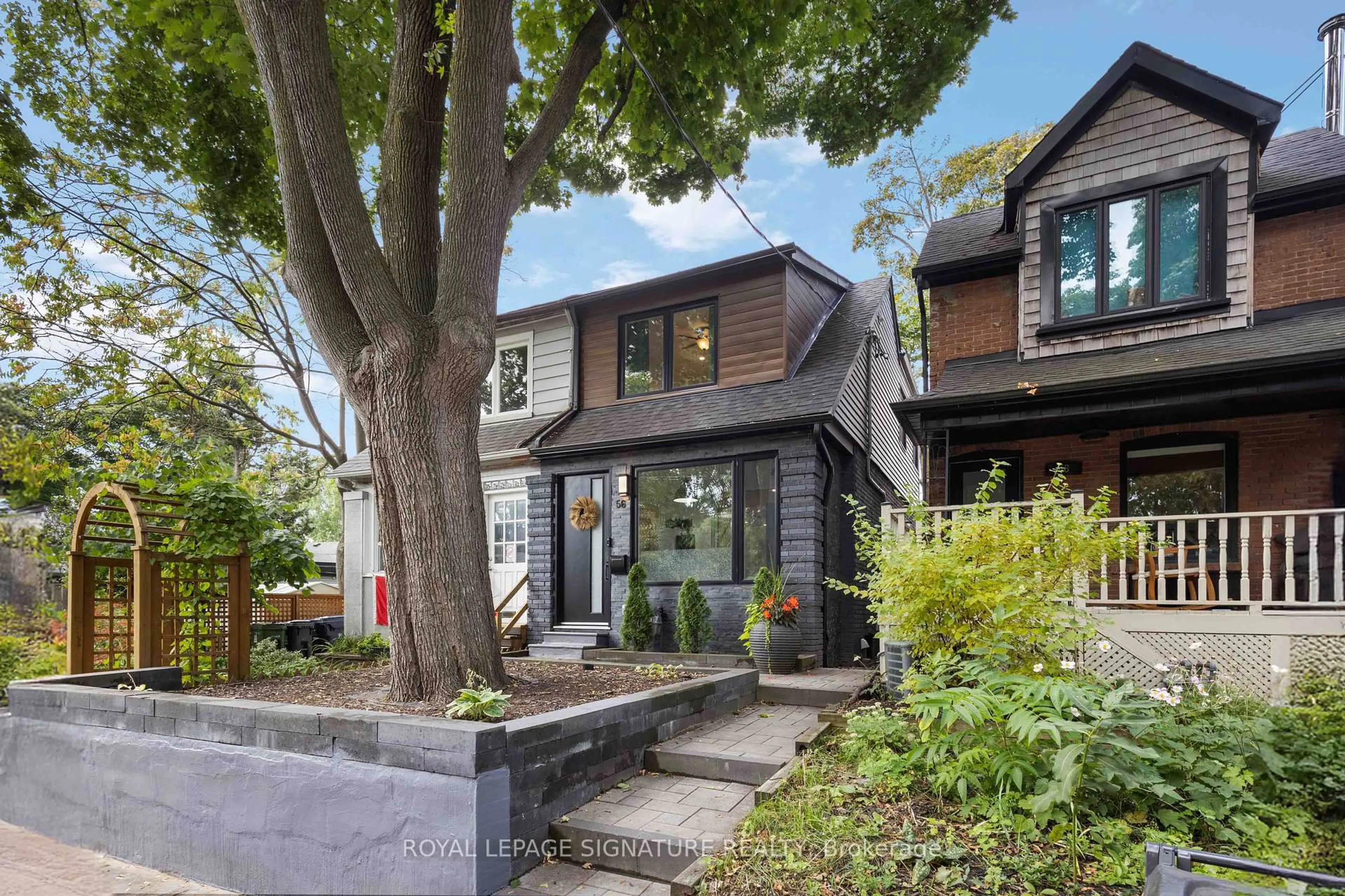 Home with brick exterior material, street for 56 Drayton Ave, Toronto Ontario M4C 3L9