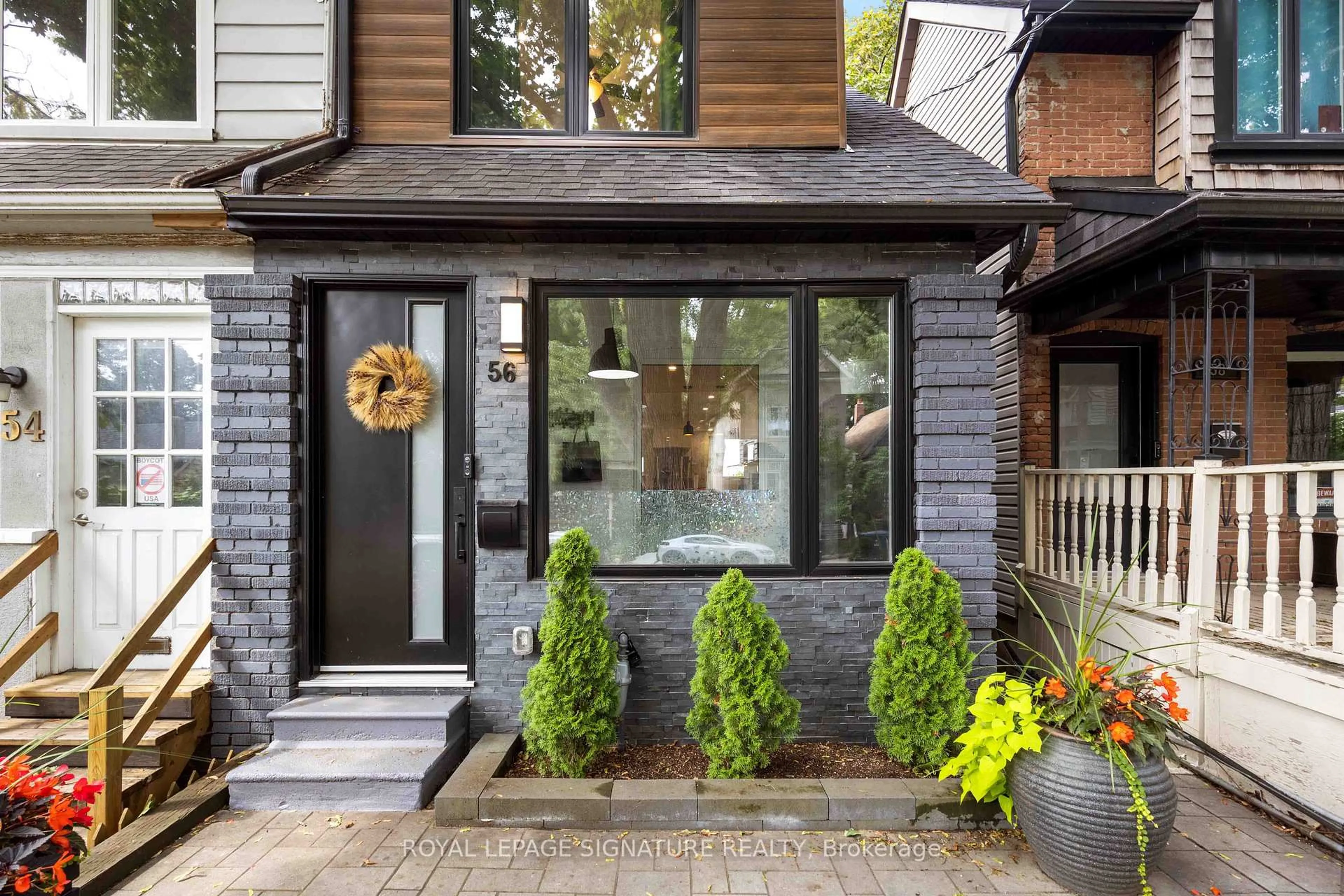 Home with brick exterior material, street for 56 Drayton Ave, Toronto Ontario M4C 3L9