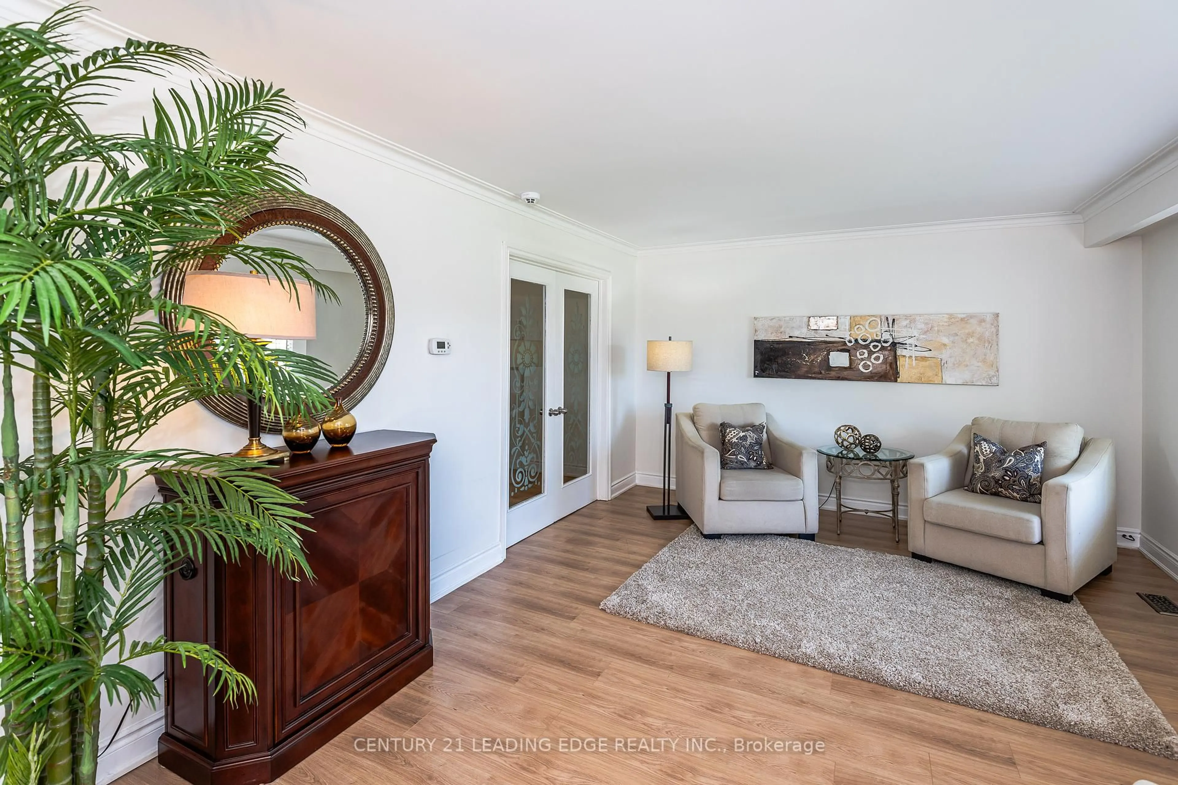 Living room with furniture, wood/laminate floor for 14 Amberjack Blvd, Toronto Ontario M1H 2J3