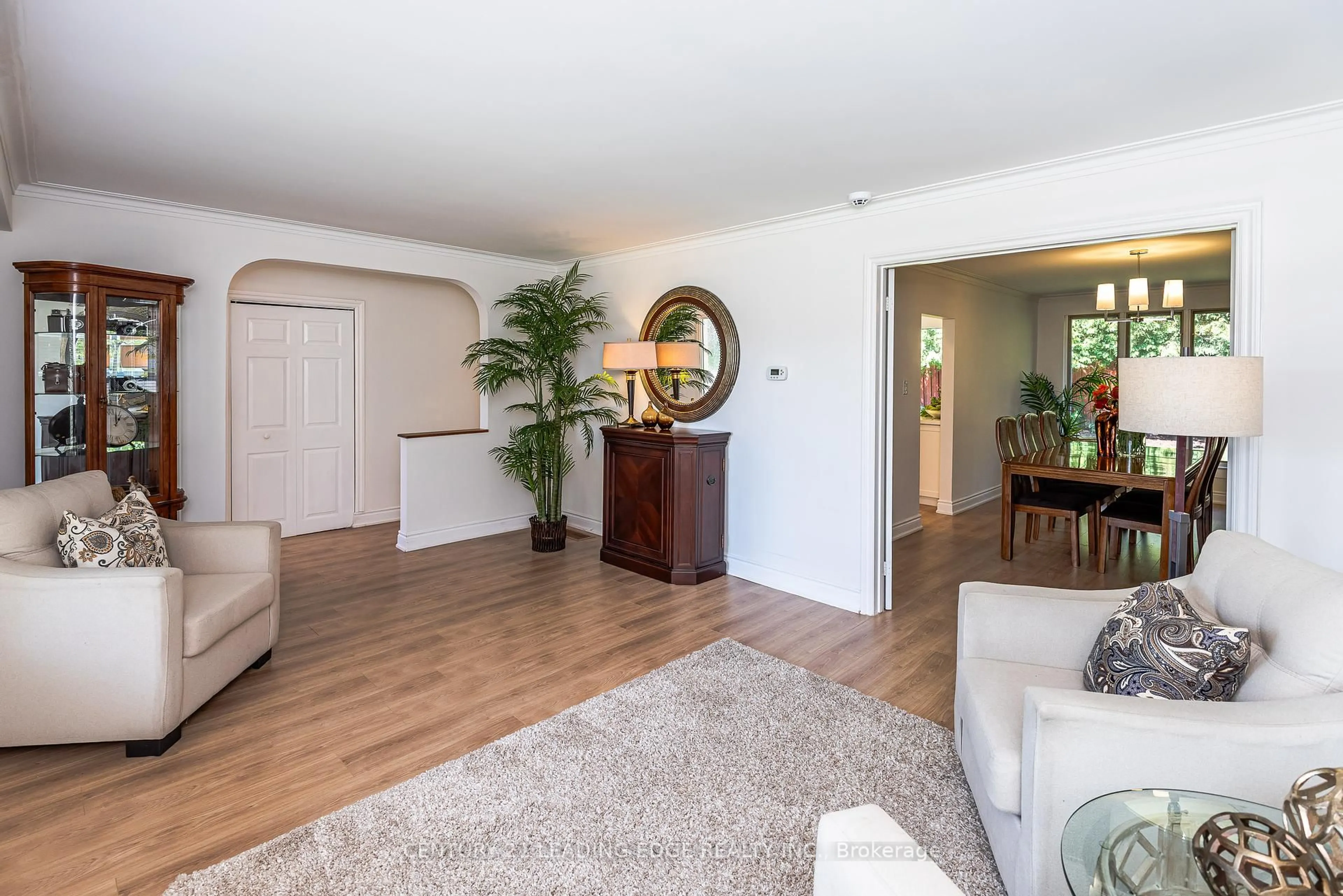Living room with furniture, wood/laminate floor for 14 Amberjack Blvd, Toronto Ontario M1H 2J3