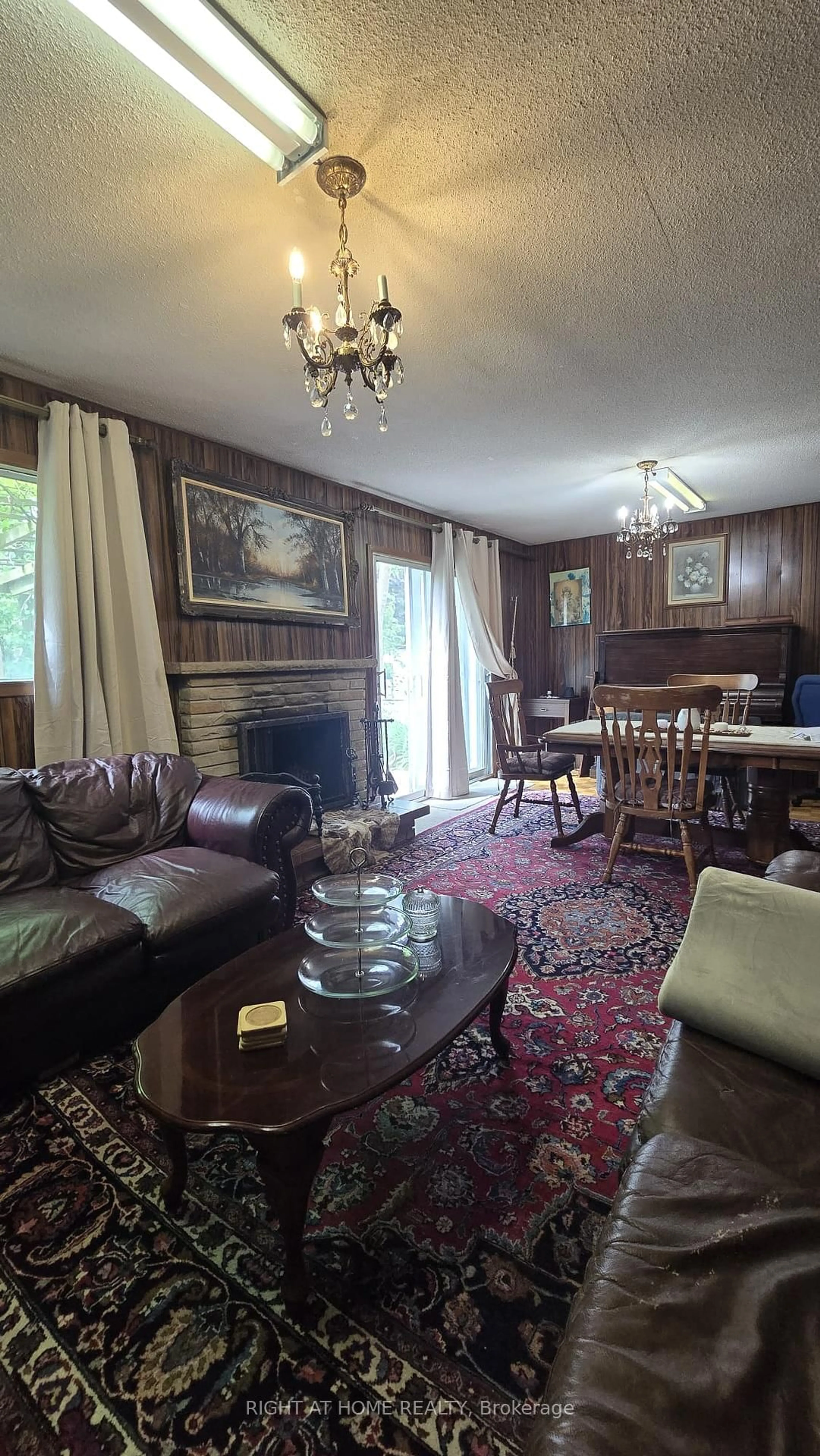 Living room with furniture, wood/laminate floor for 12 Fairglen Ave, Toronto Ontario M1W 1G7