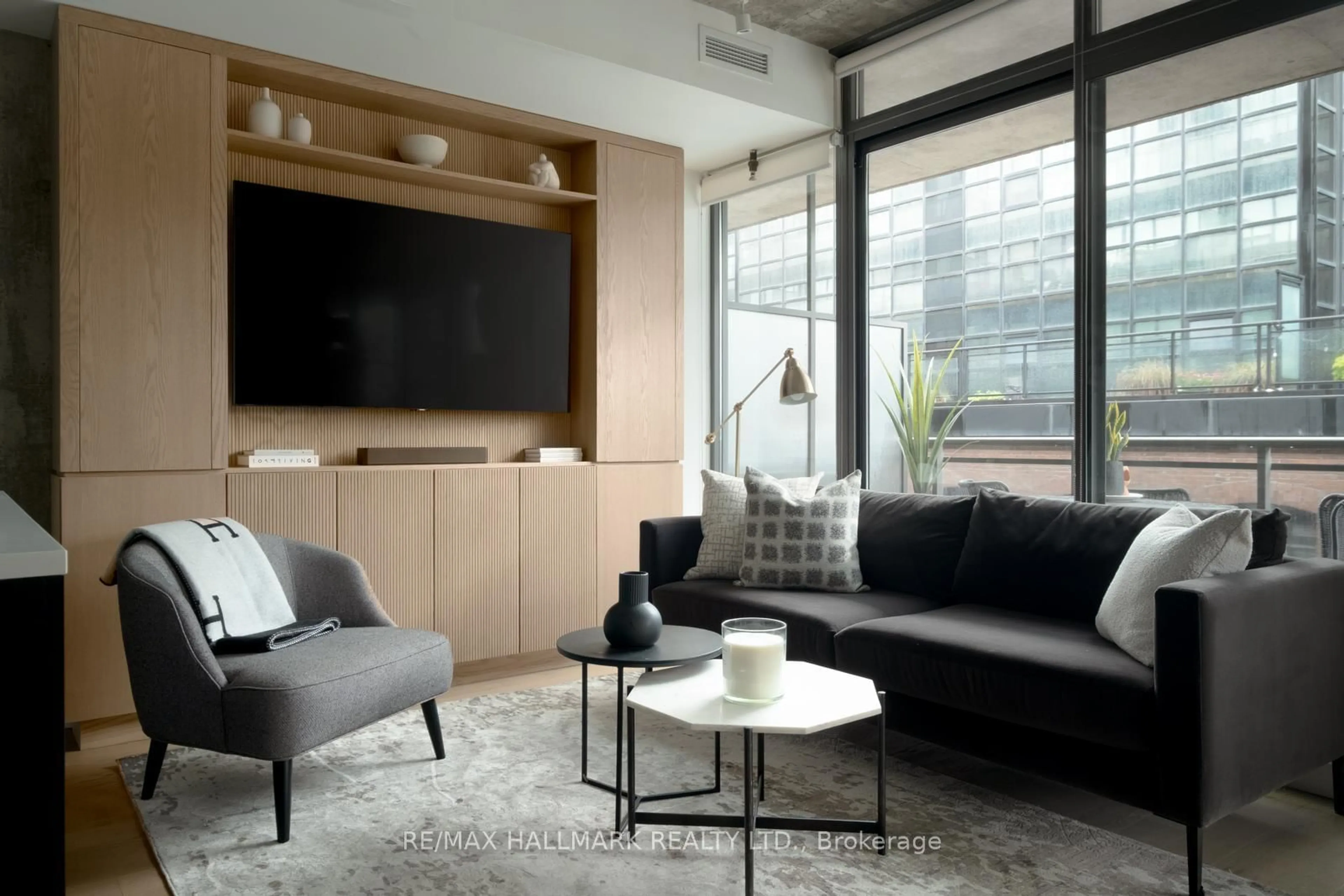 Living room with furniture, unknown for 90 Broadview Ave #607, Toronto Ontario M4M 0A7