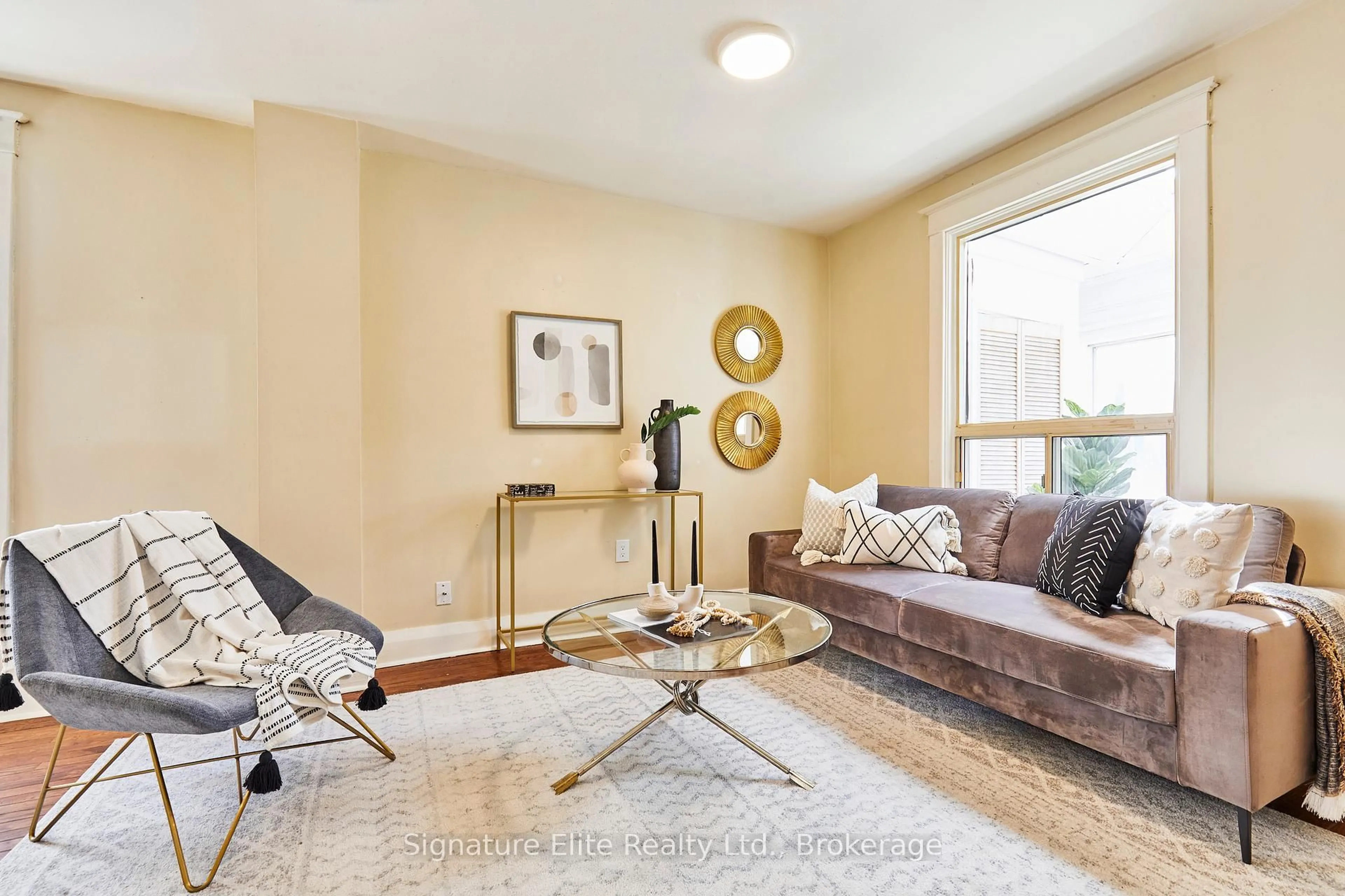 Living room with furniture, unknown for 808 Sammon Ave, Toronto Ontario M4C 2E8
