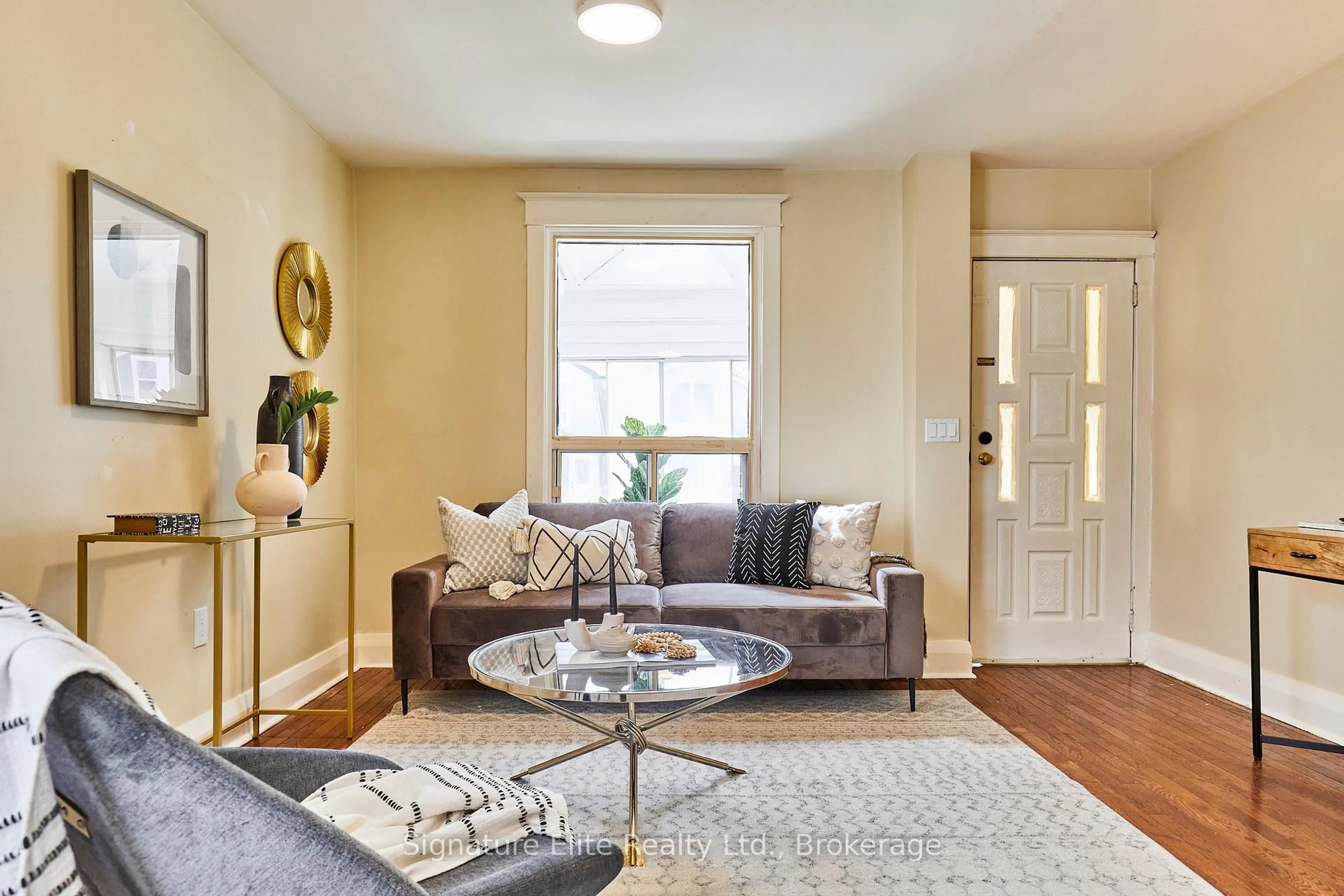 Living room with furniture, unknown for 808 Sammon Ave, Toronto Ontario M4C 2E8