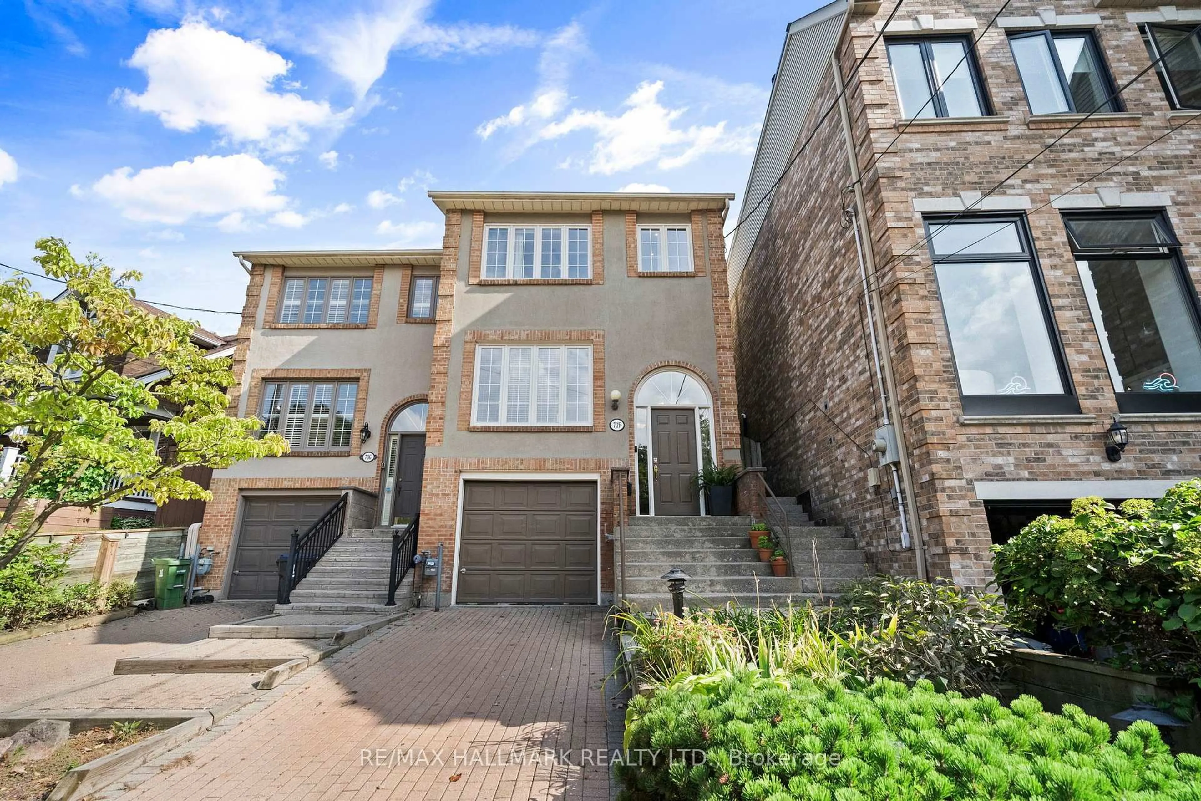 Home with brick exterior material, street for 73F Corley Ave, Toronto Ontario M4E 1T8