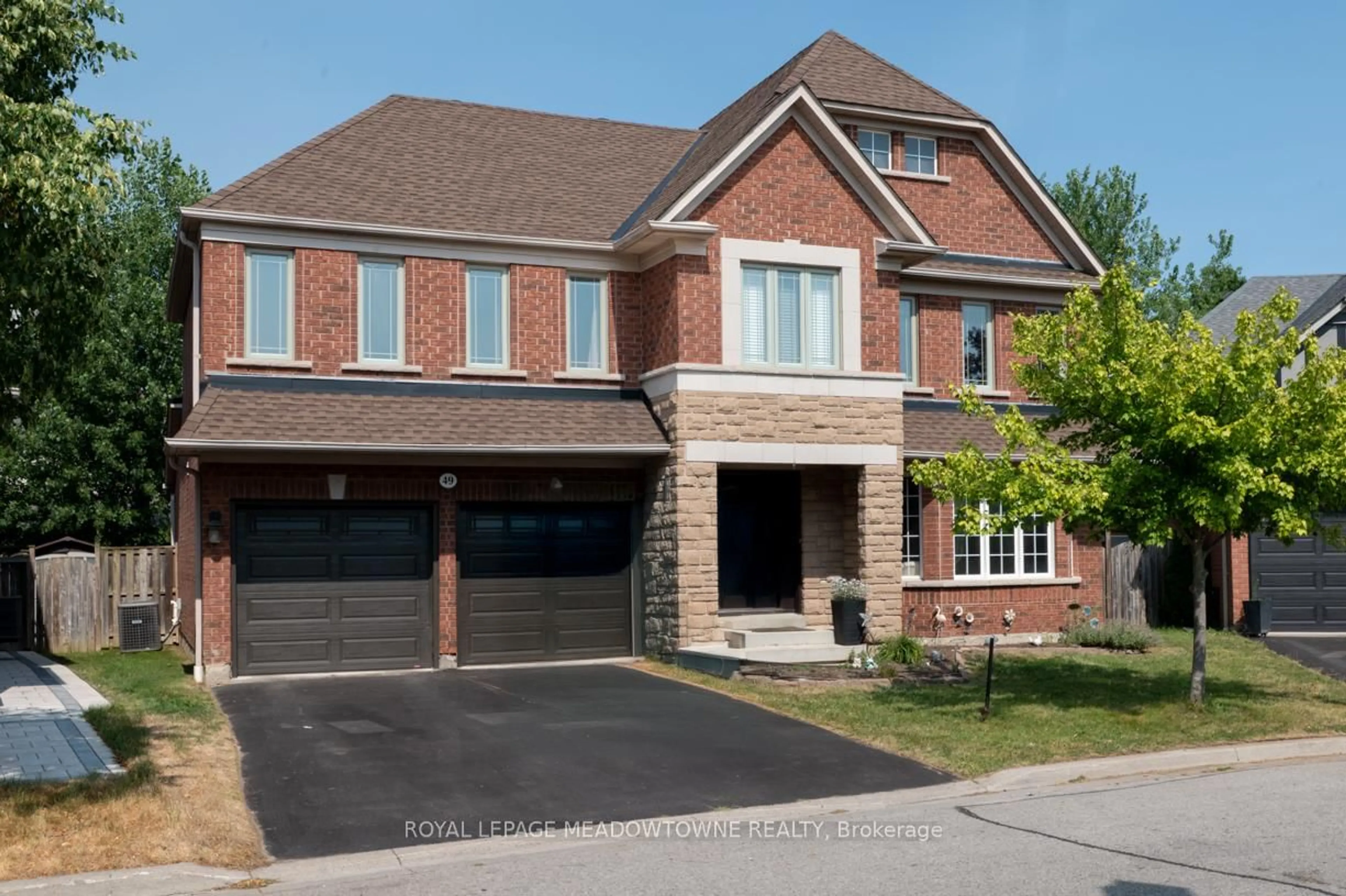 Home with brick exterior material, street for 49 Montebello Cres, Ajax Ontario L1T 4P2