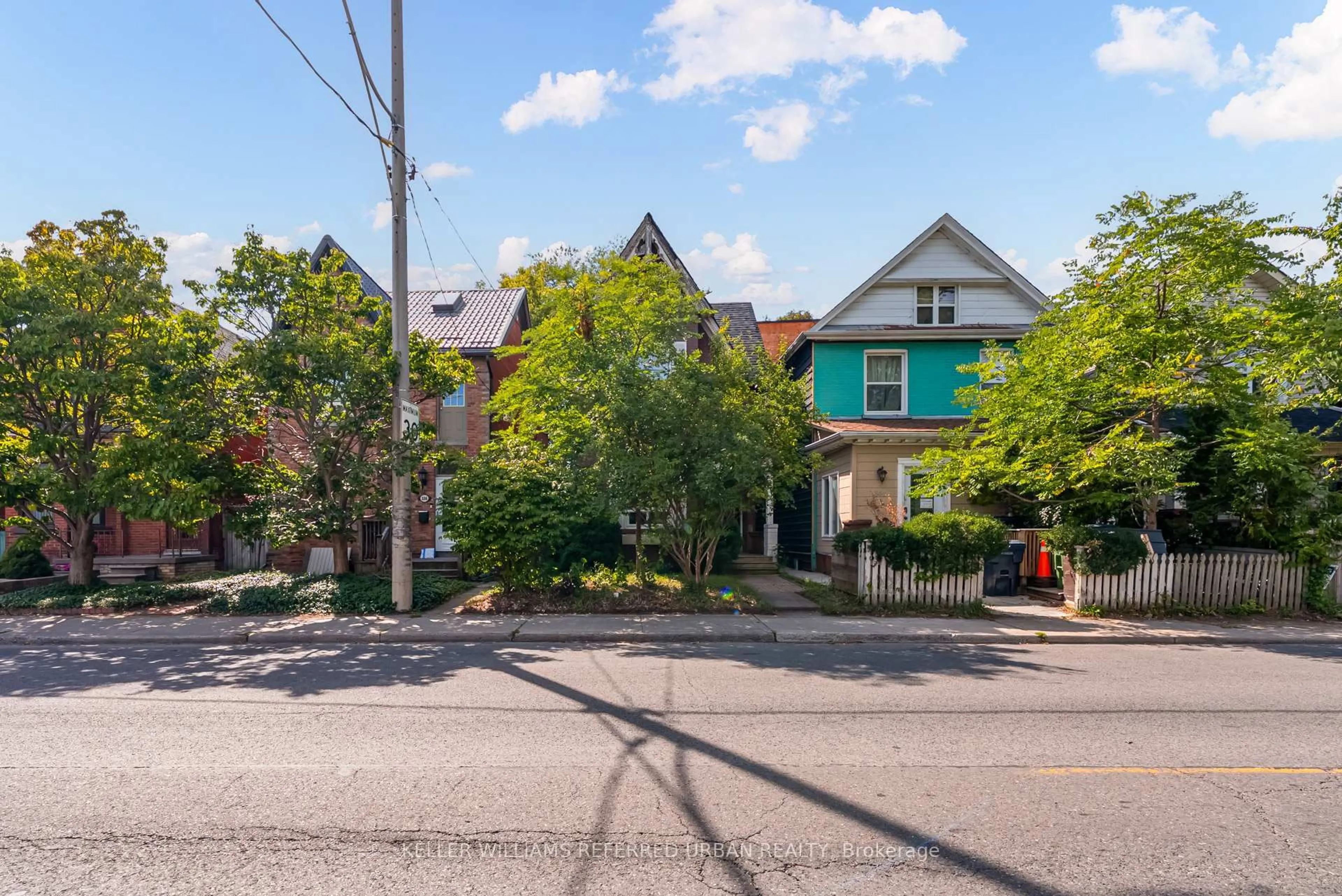 A pic from outside/outdoor area/front of a property/back of a property/a pic from drone, street for 338 Main St, Toronto Ontario M4C 4X7
