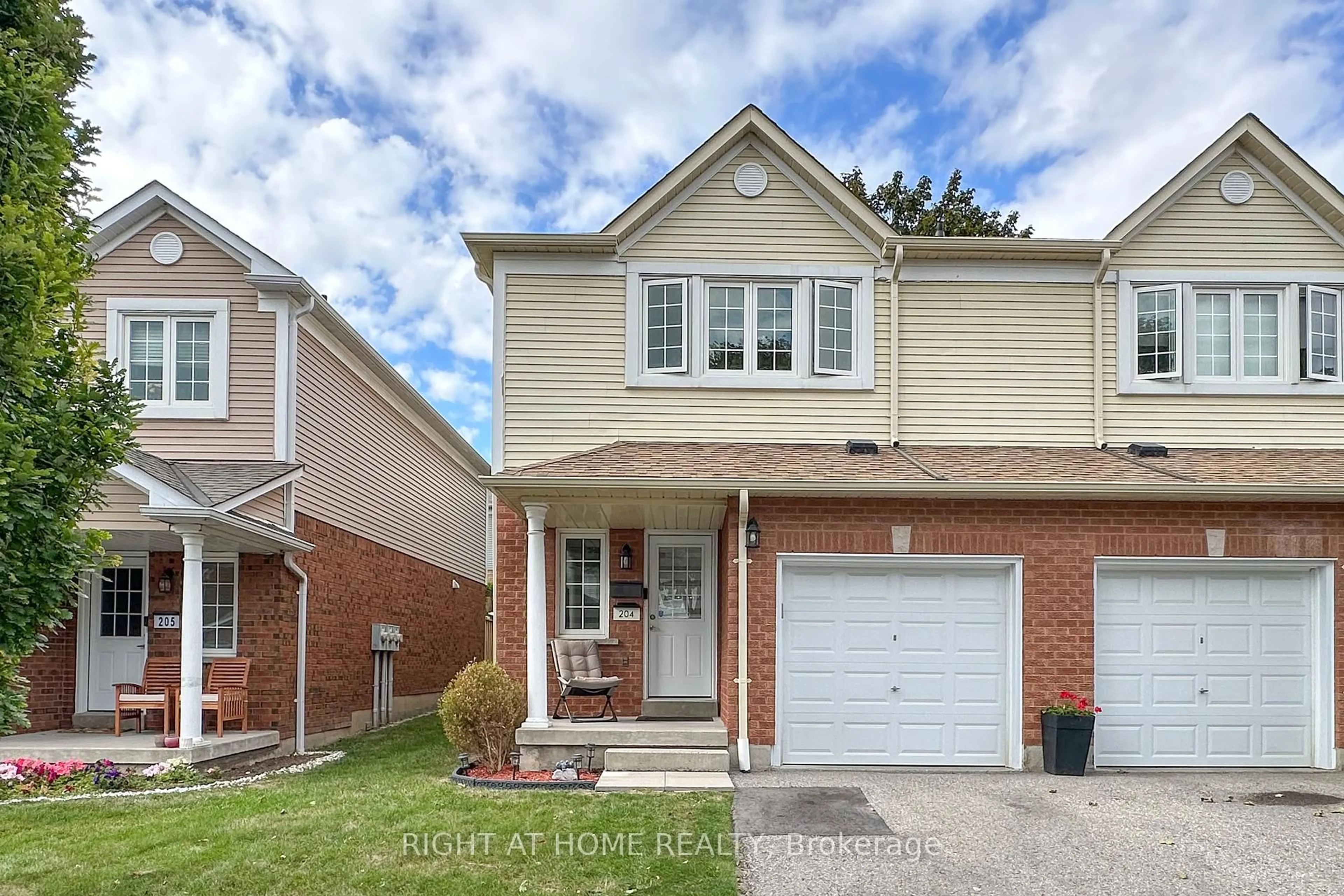 Home with brick exterior material, street for 10 Bassett Blvd #204, Whitby Ontario L1N 9C8
